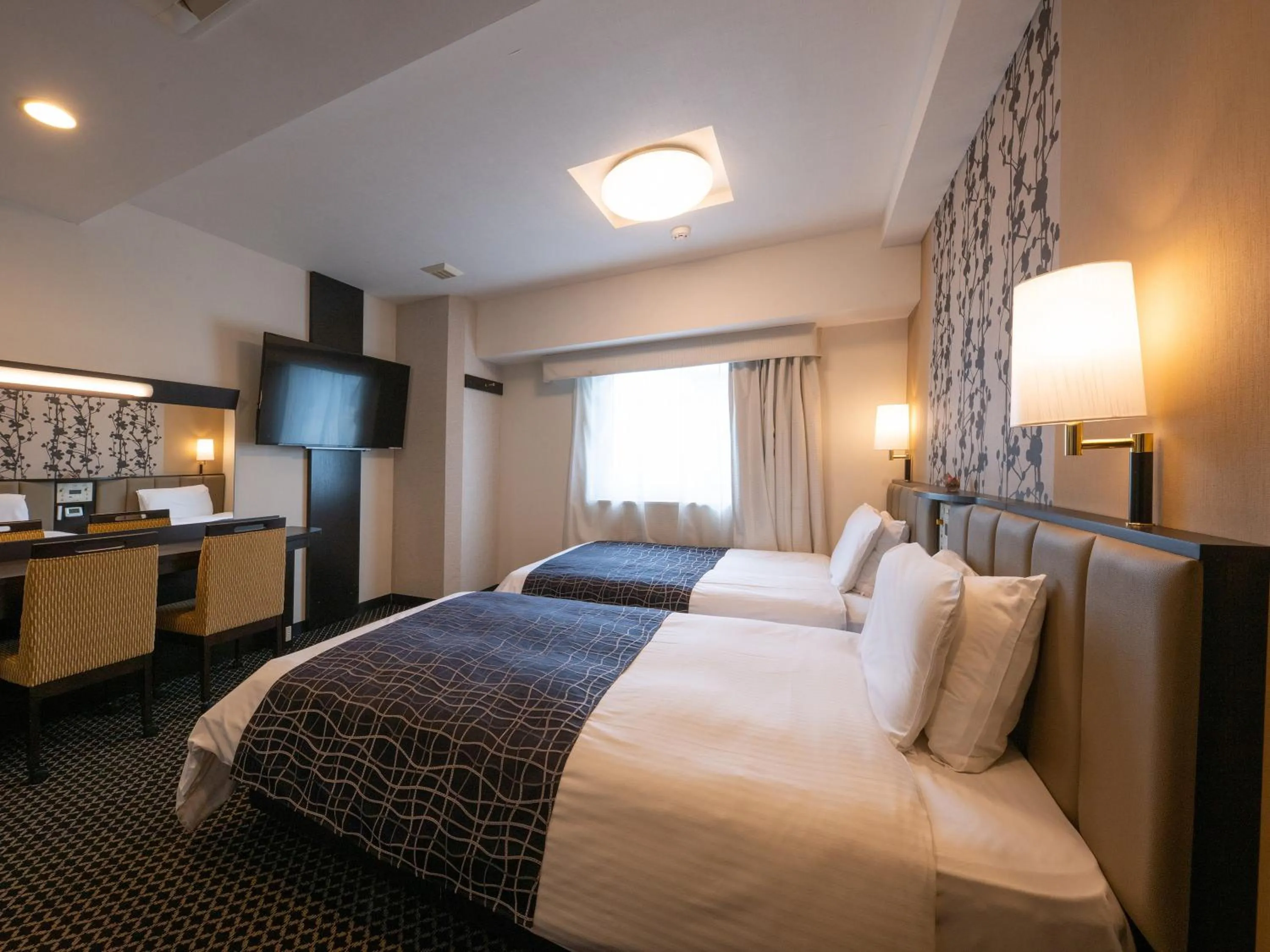 Bed in APA Hotel Nagoya Sakae Kita