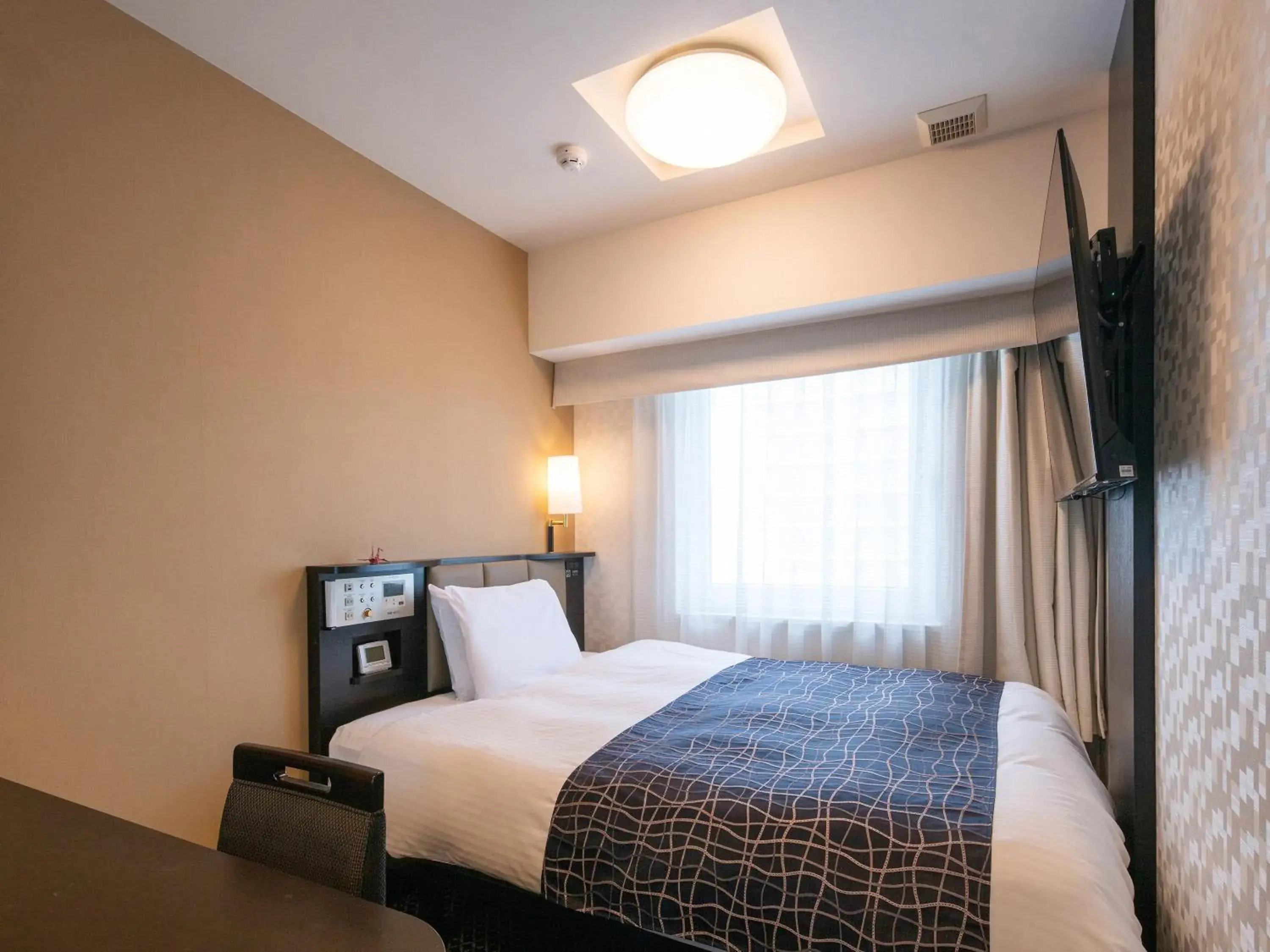 Bed in APA Hotel Nagoya Sakae Kita Bed in APA Hotel Nagoya Sakae Kita