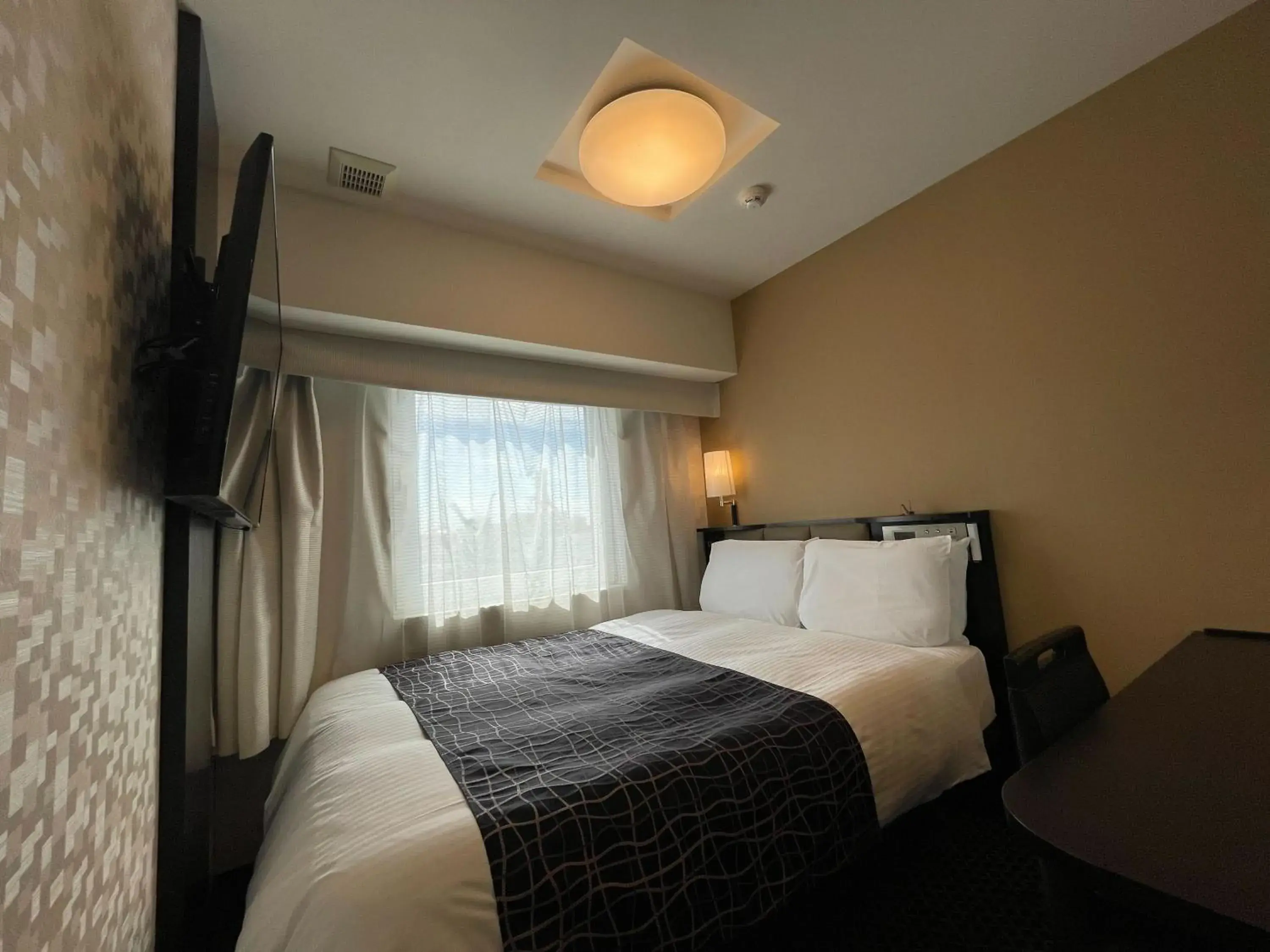 Bed in APA Hotel Nagoya Sakae Kita Bed in APA Hotel Nagoya Sakae Kita