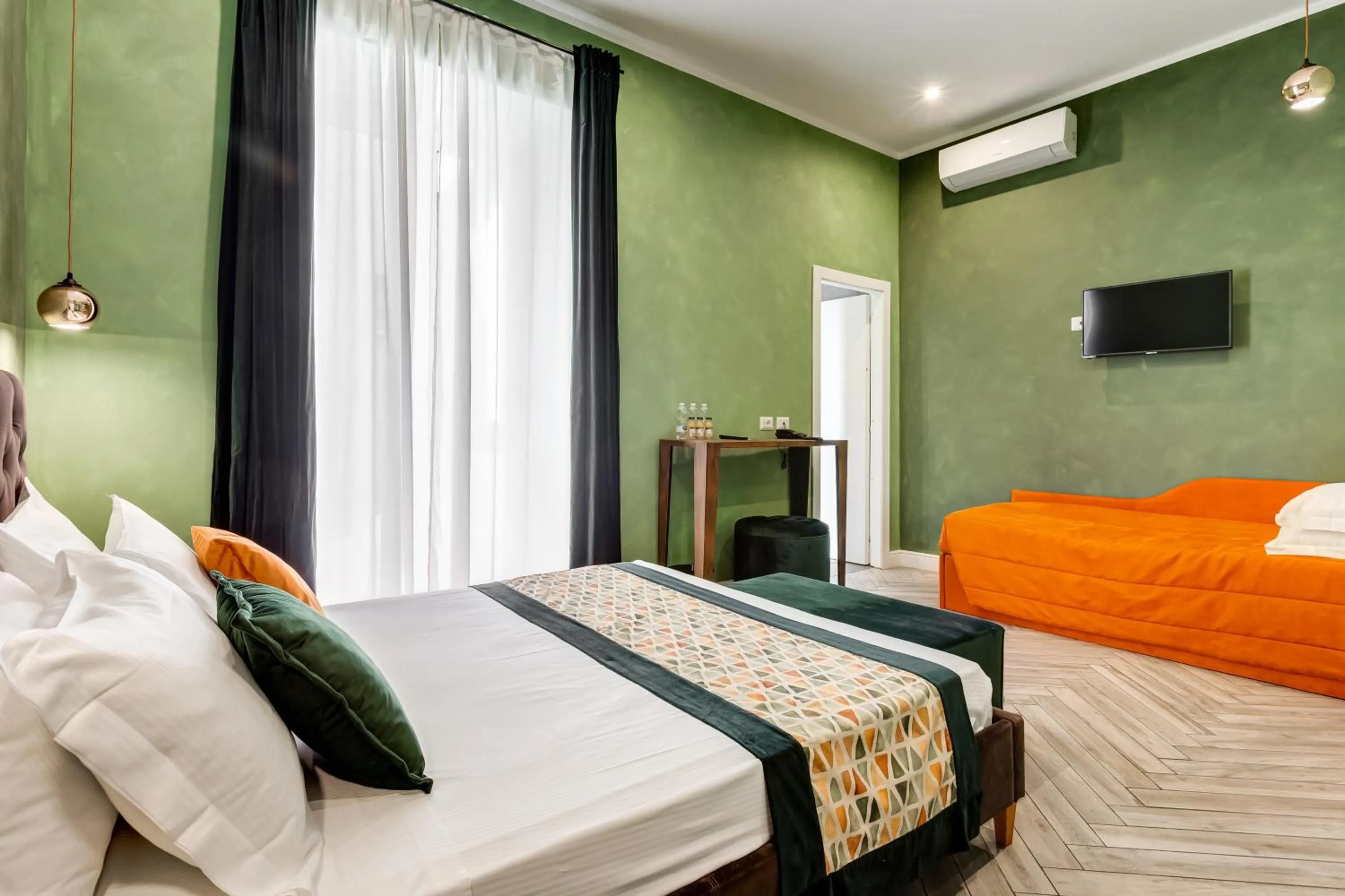 Communal lounge/ TV room, Bed in Ripetta Natural Suites