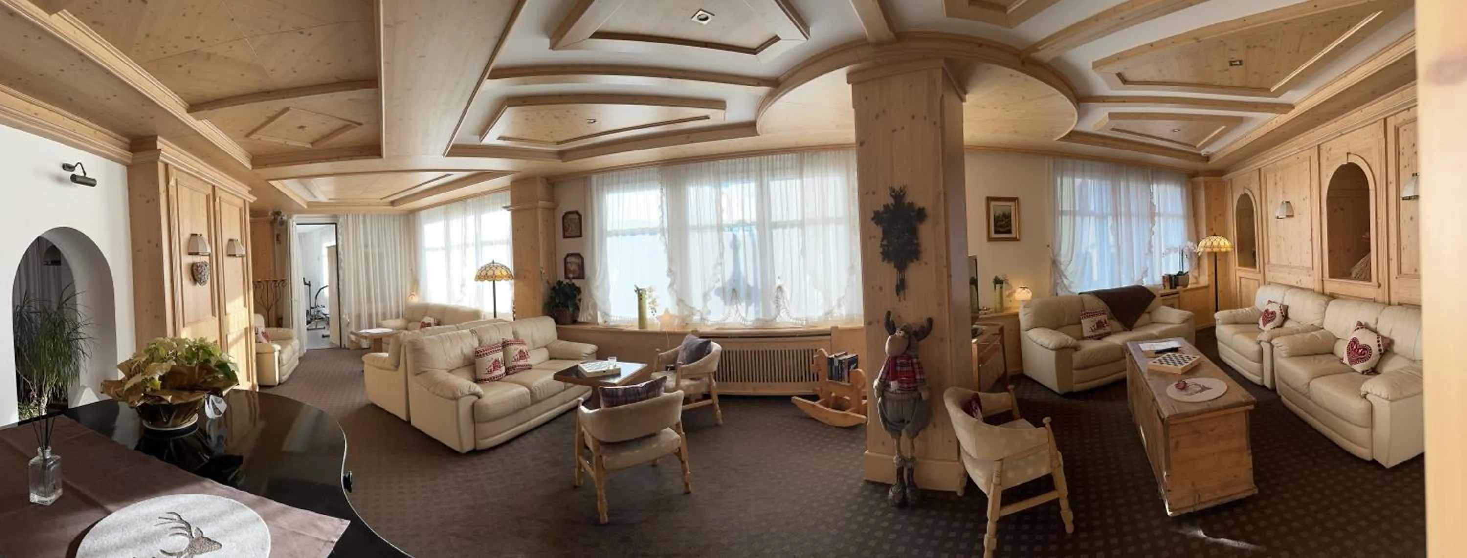 Living room in Folgaria Post Hotel