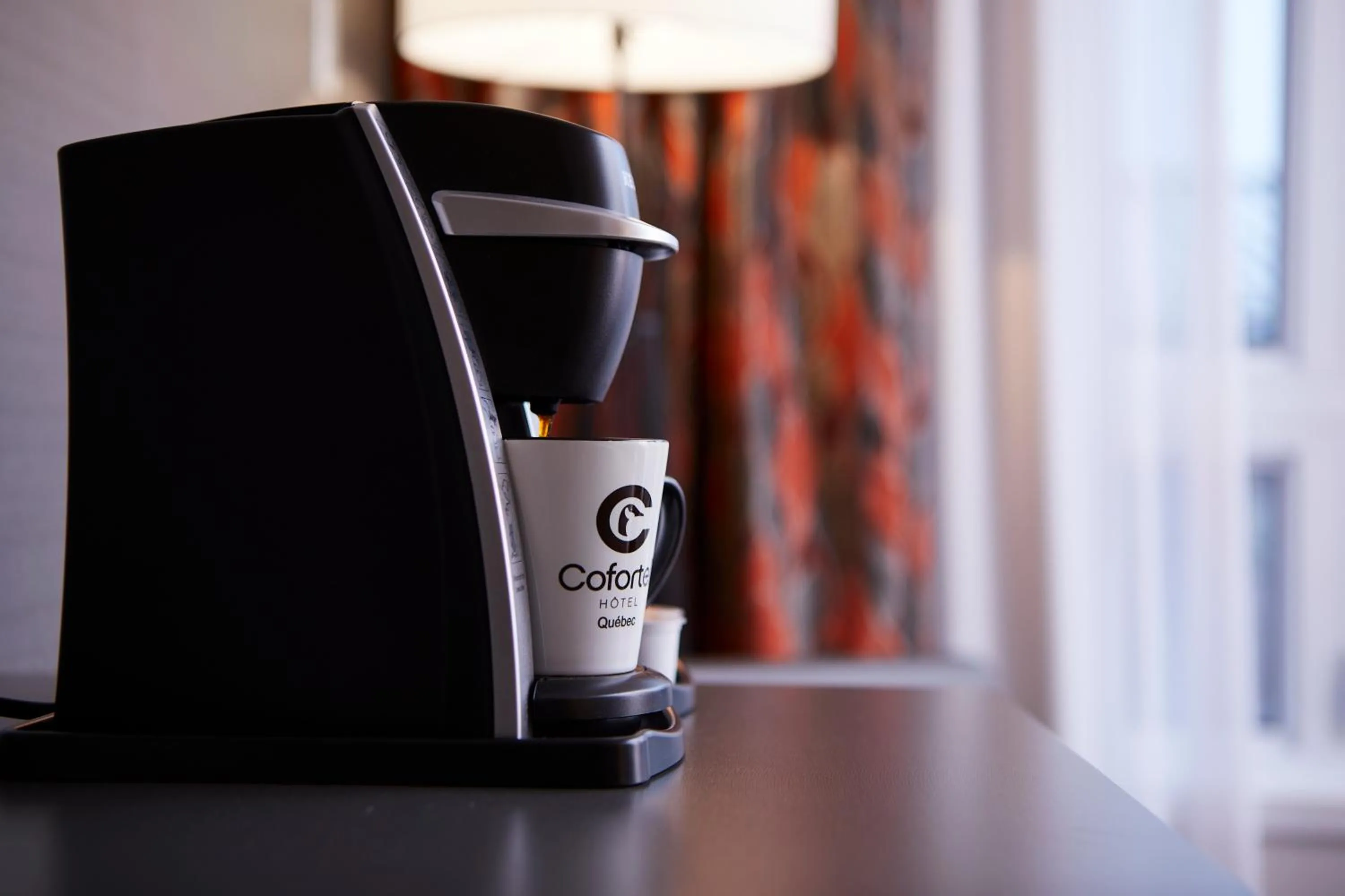 Coffee/tea facilities in Hôtel Cofortel