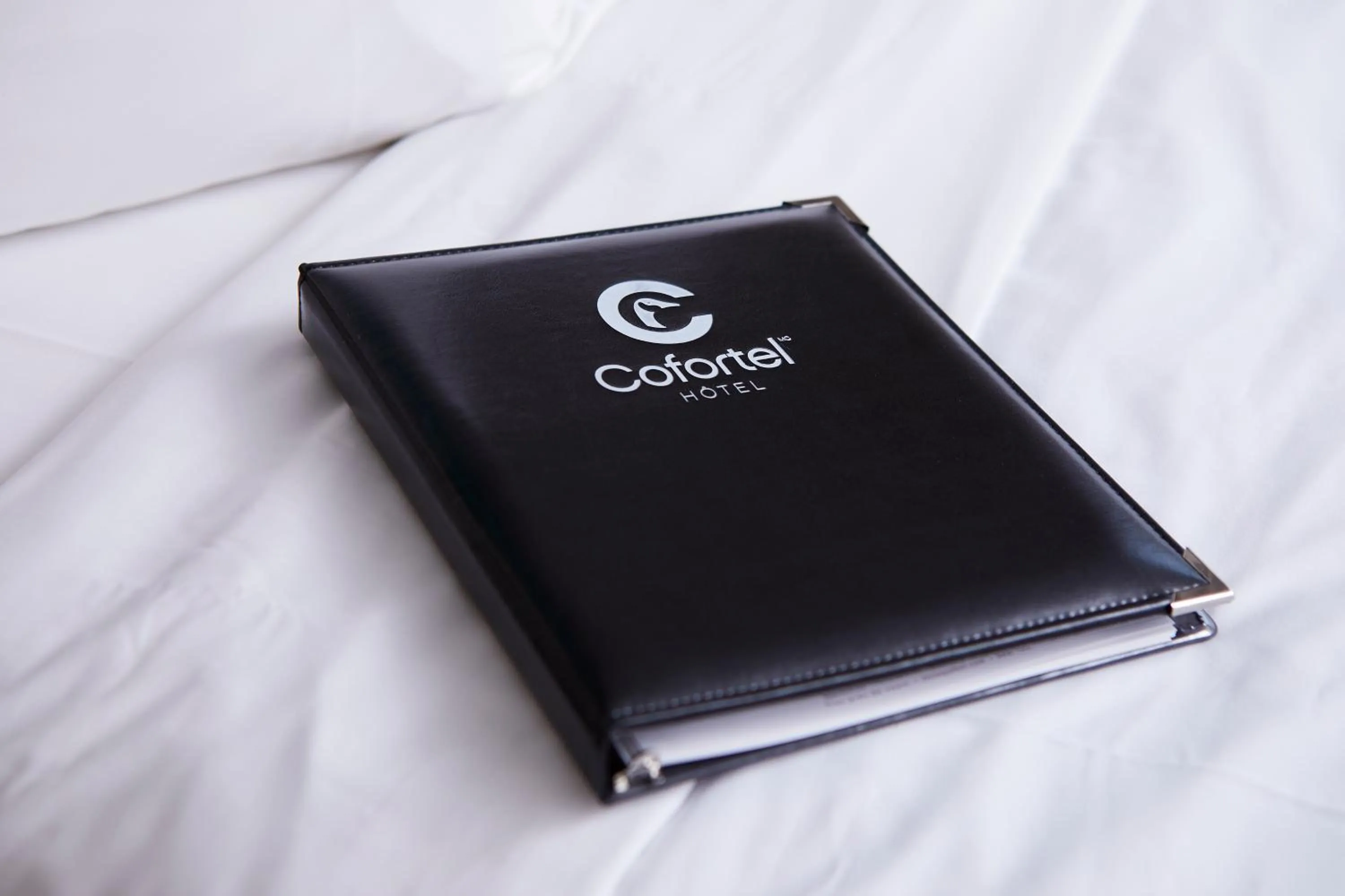 Bed in Hôtel Cofortel