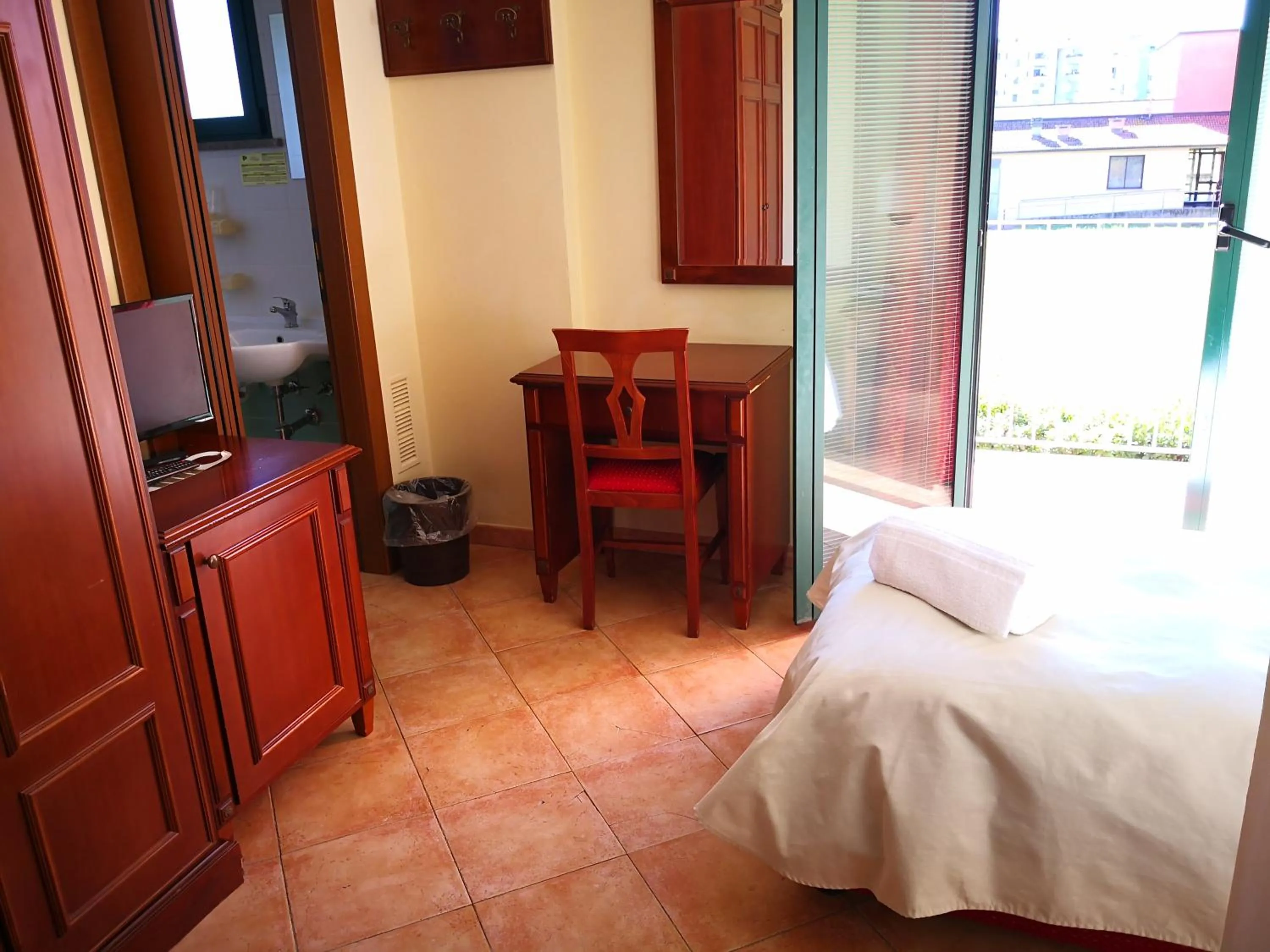 Seating area, Bed in Casa Betania