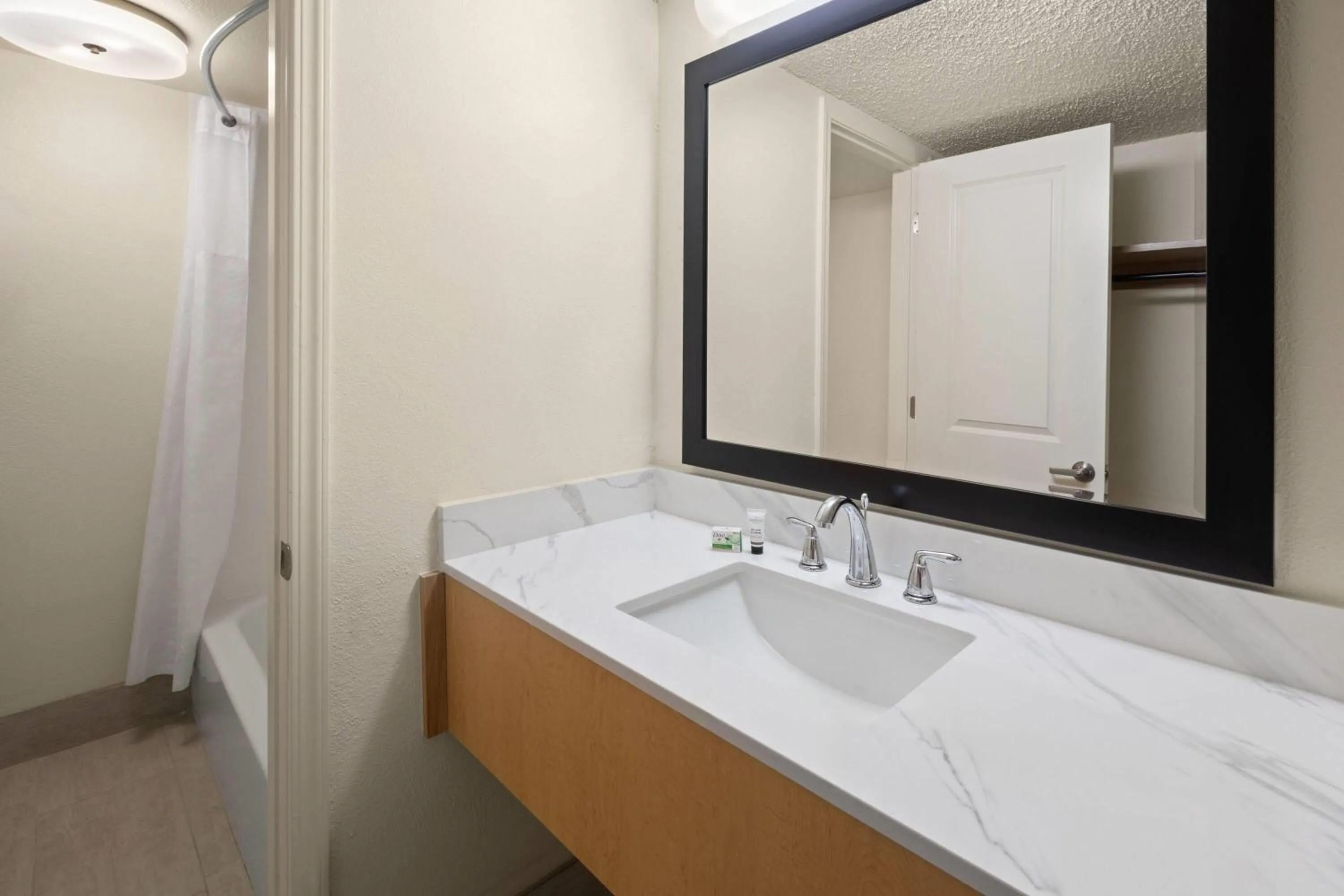 Bathroom in Ramada by Wyndham Merced