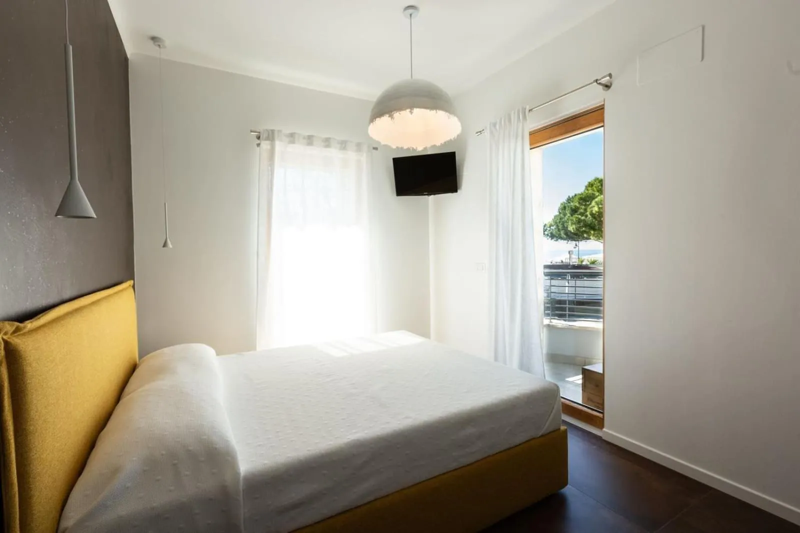 Bed in Sunset Room&Breakfast