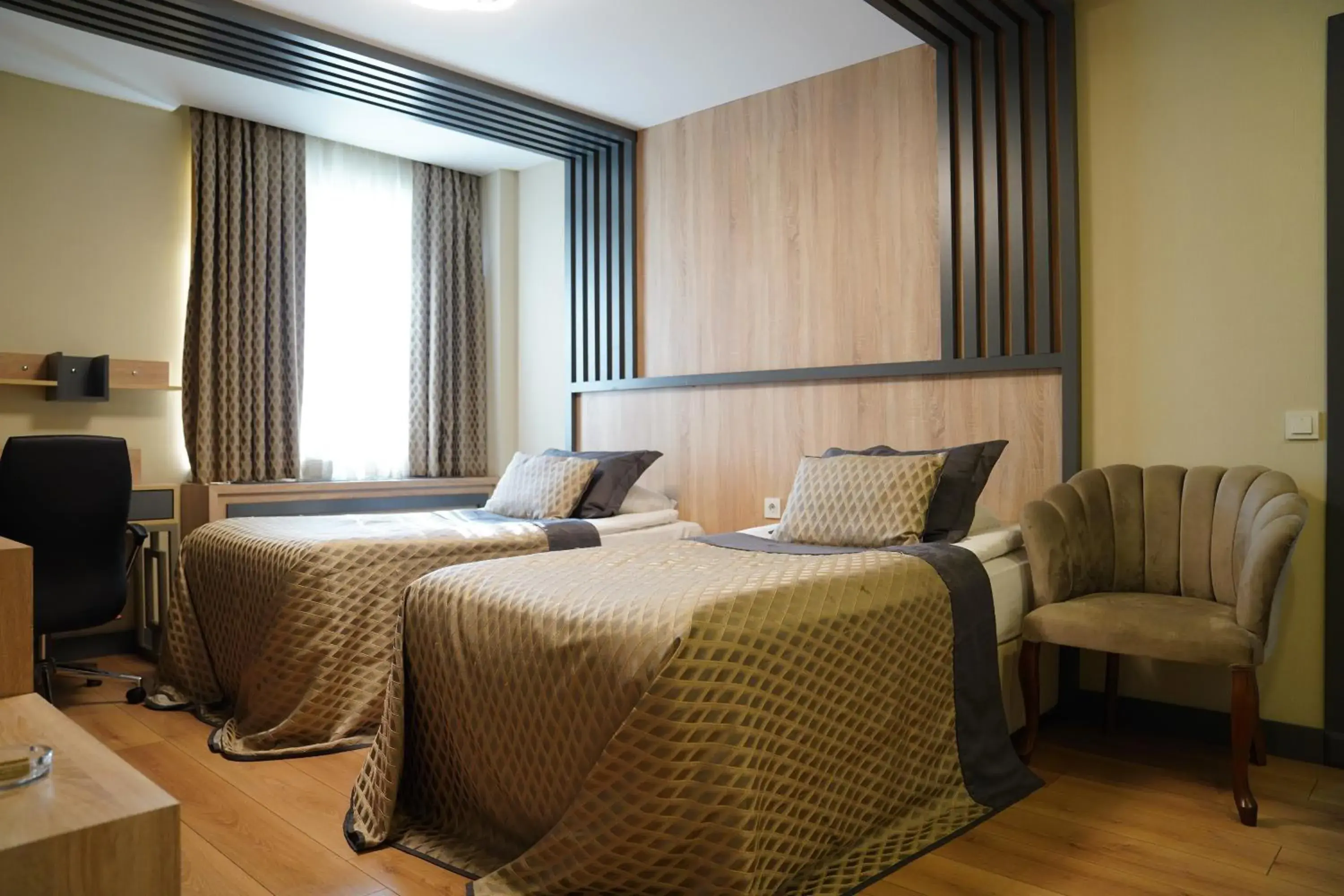 Bed in Dafne Hotel Bed in Dafne Hotel