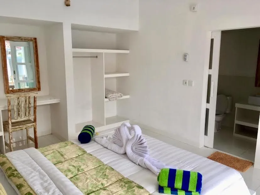 Bed in Narayana Homestay