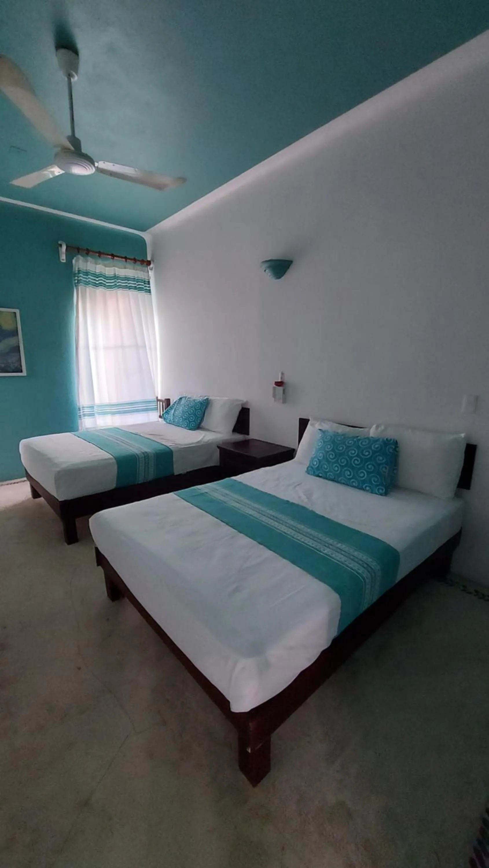 Bed in Delphinus Inn