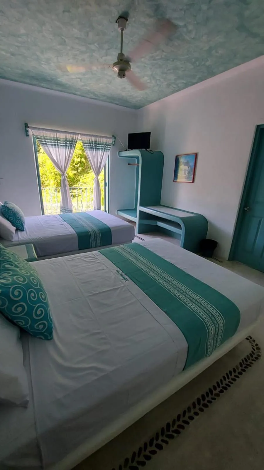 Bed in Delphinus Inn