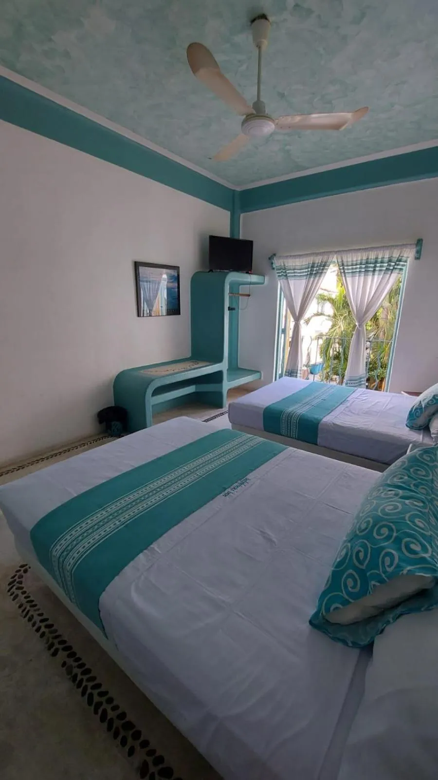 Bed in Delphinus Inn