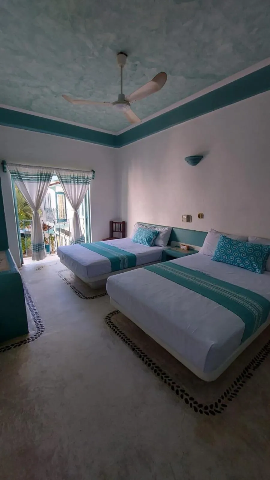 Bed in Delphinus Inn