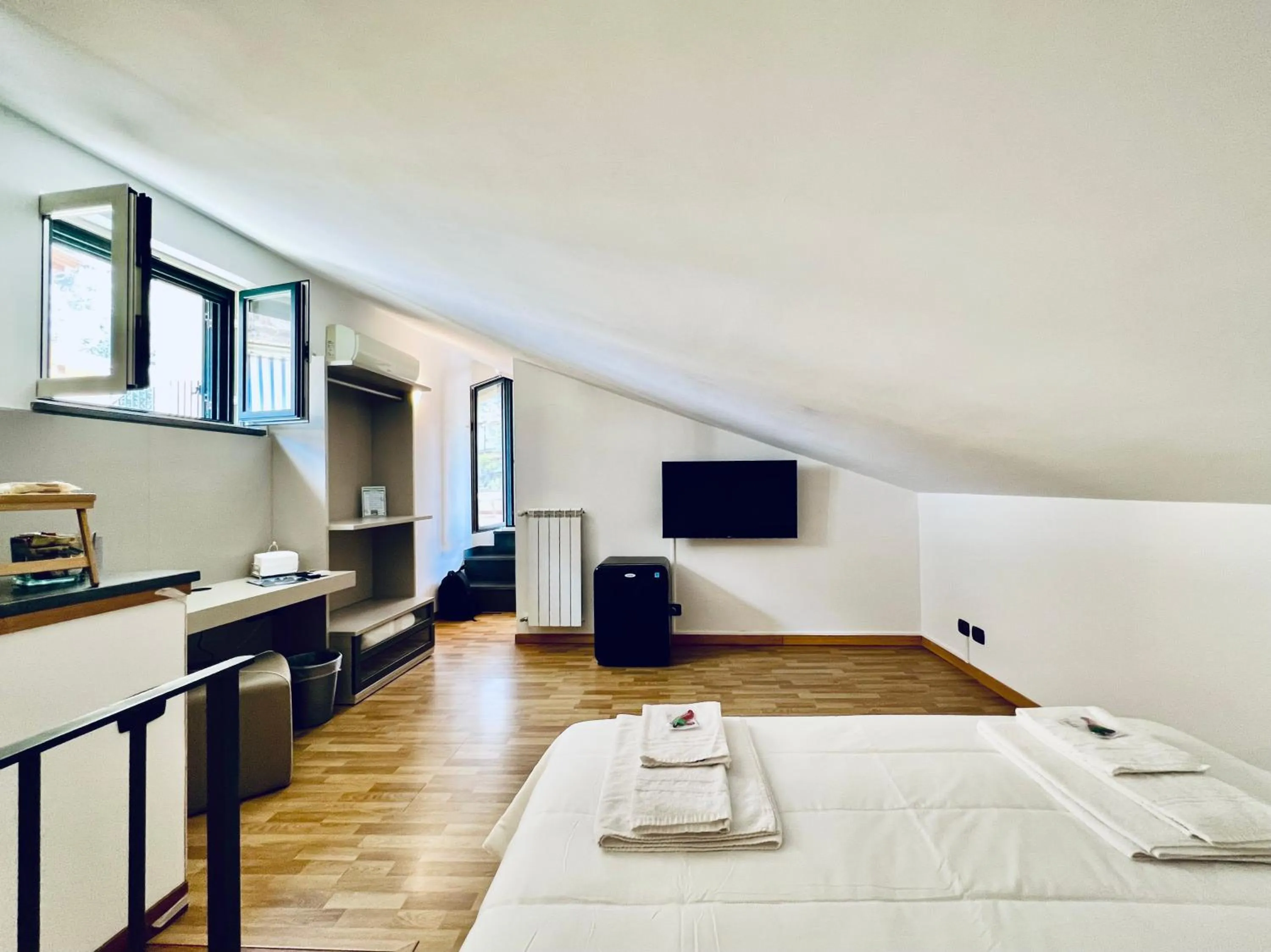 Bed in Eterea Charming Suites