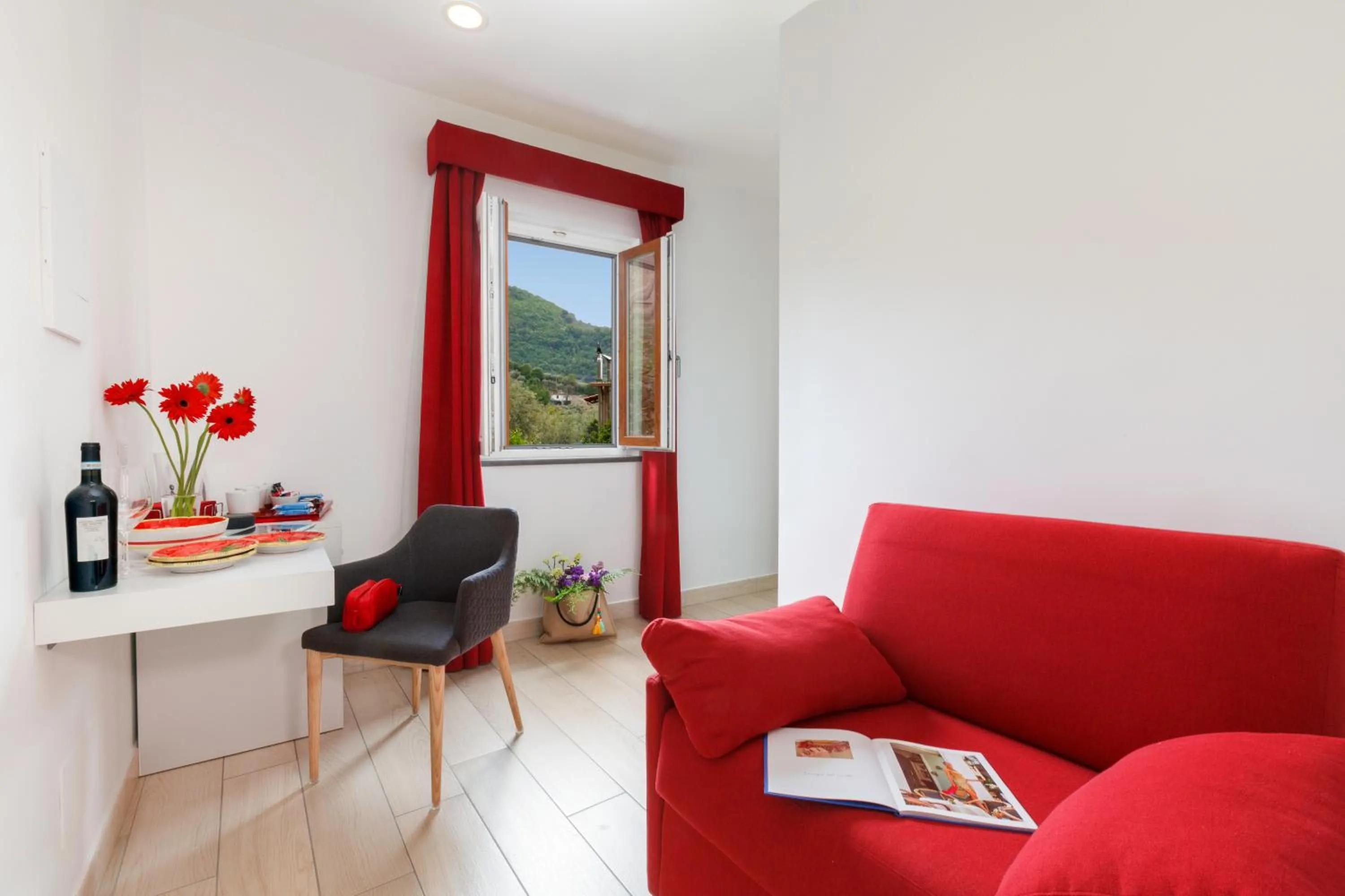 Seating area in Eterea Charming Suites