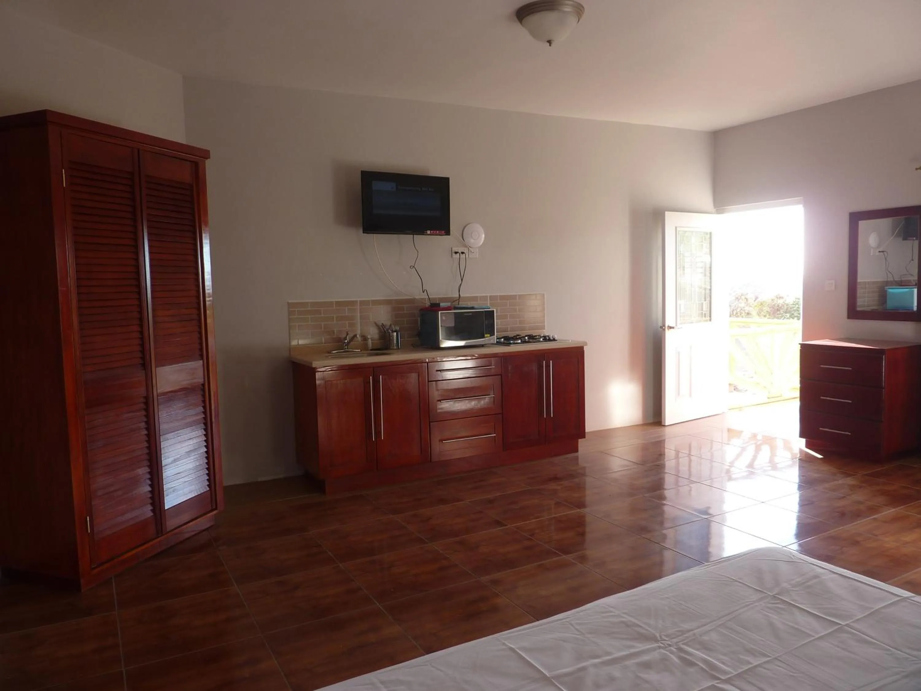 Kitchen or kitchenette in La Heliconia & Day Spa