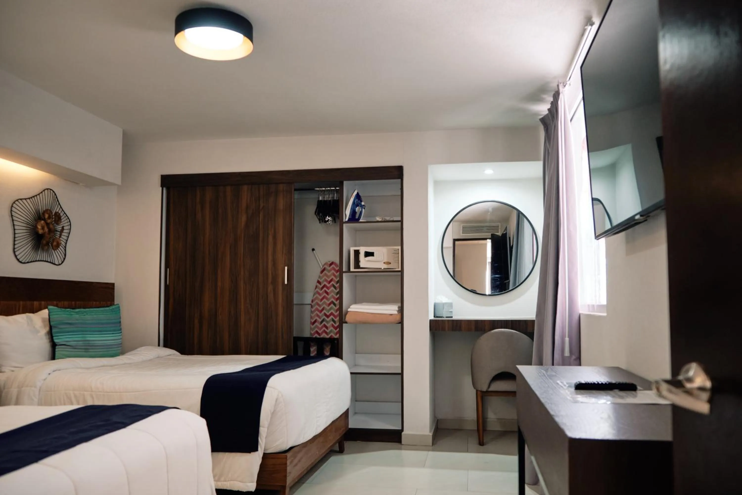 Bedroom, Bed in The Inn at Mazatlan