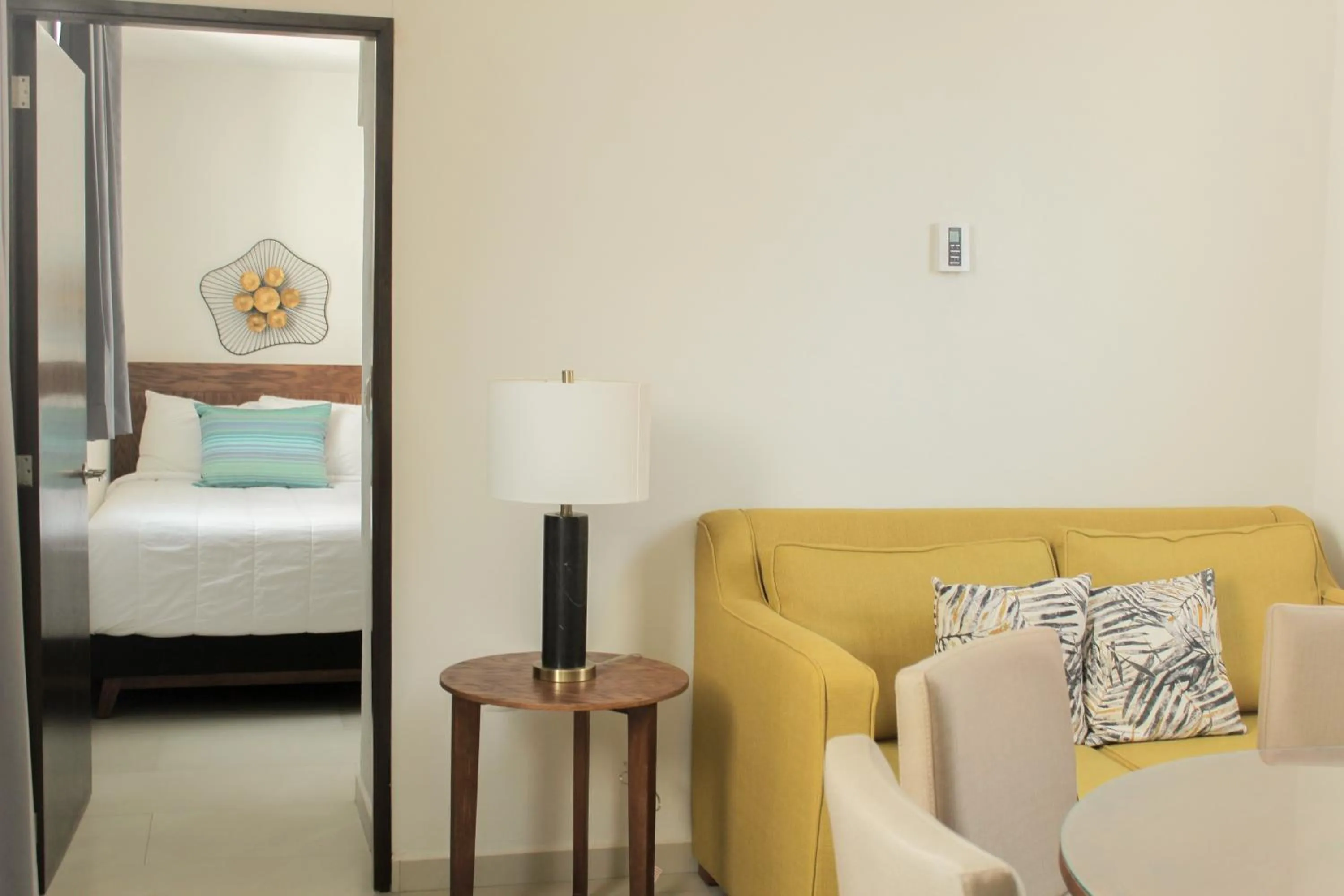 Living room, Bed in The Inn at Mazatlan