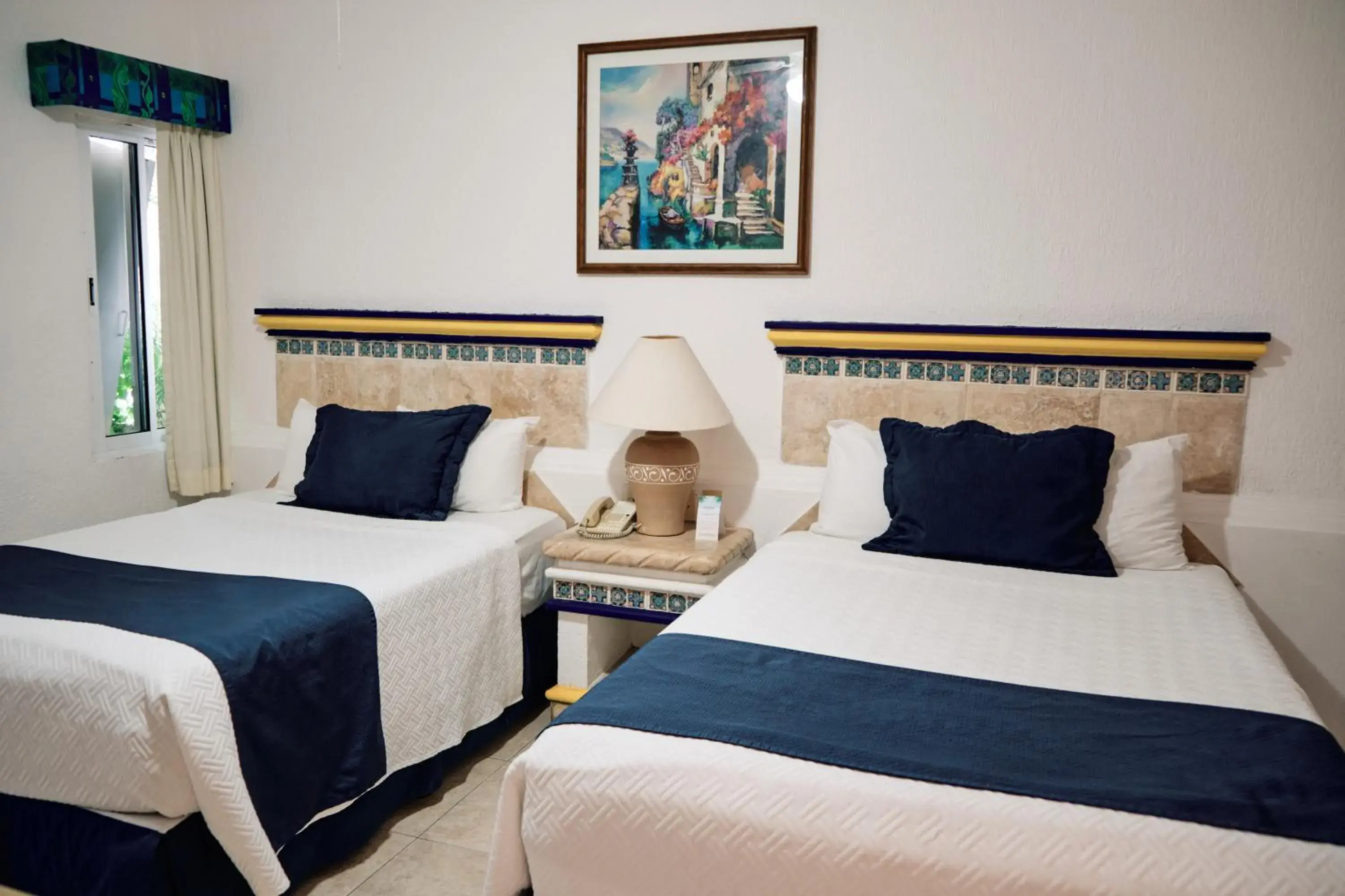 Bed in The Inn at Mazatlan Bed in The Inn at Mazatlan