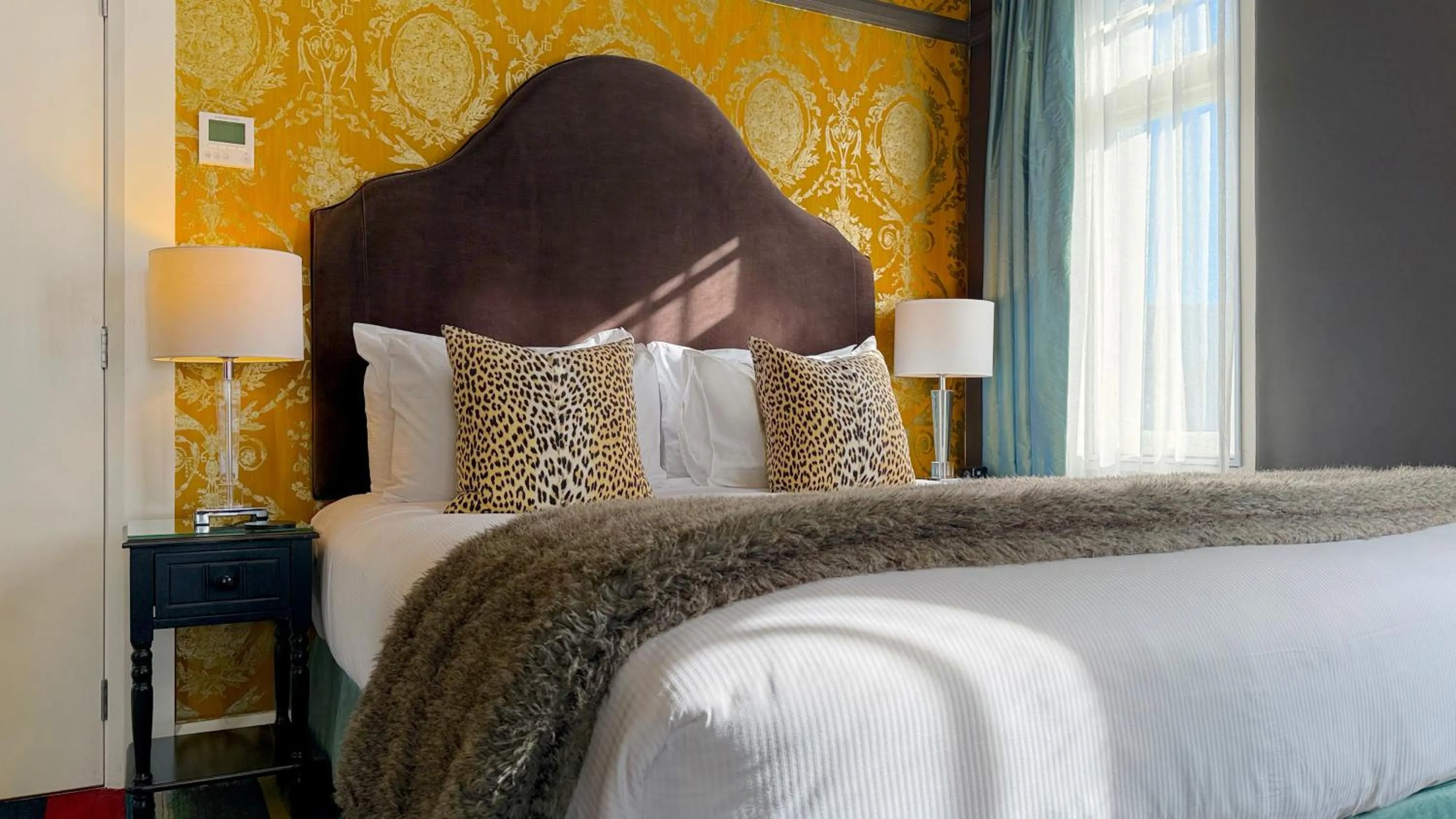 Bed in Art Deco Masonic Hotel