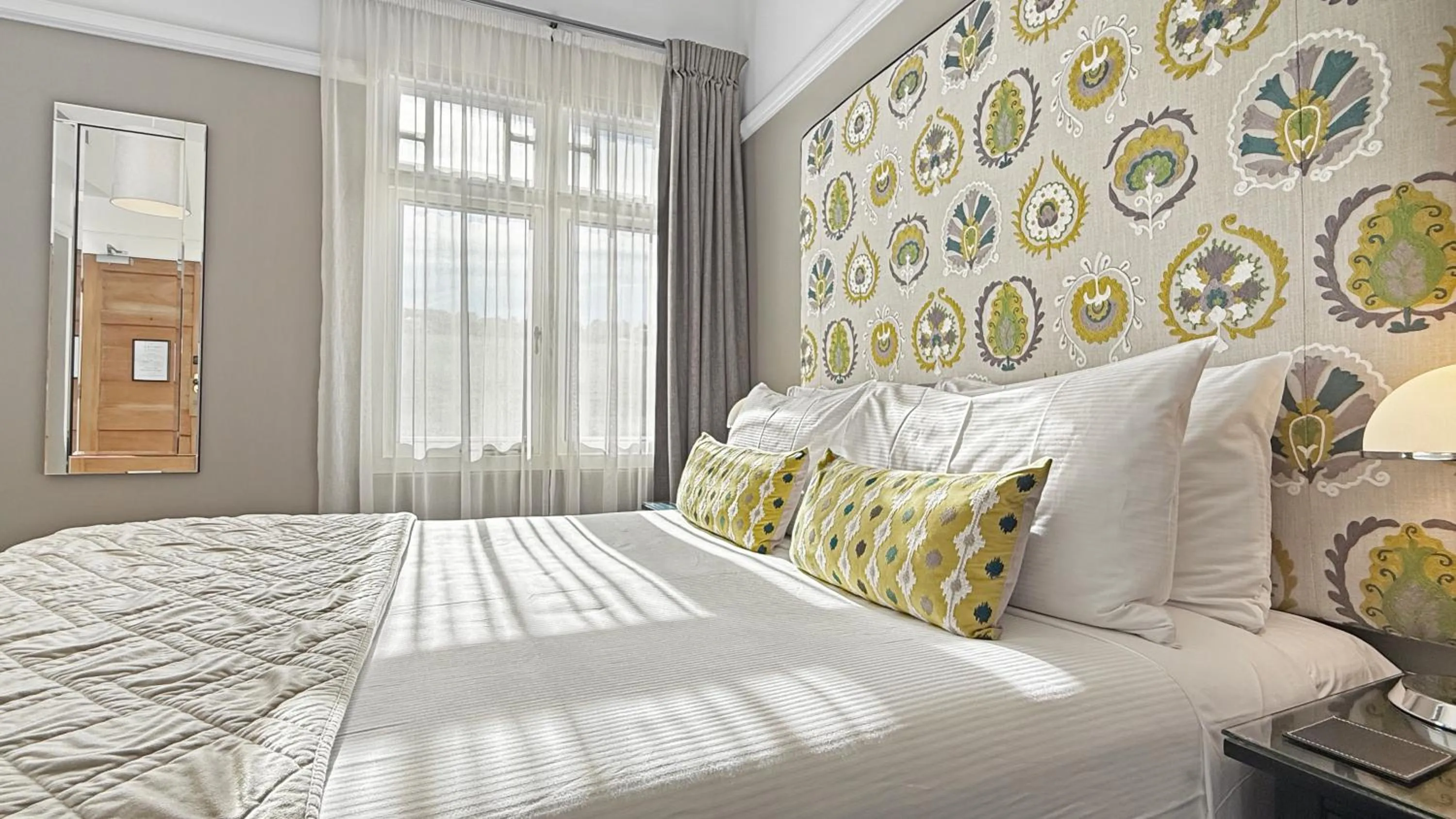 Bed in Art Deco Masonic Hotel