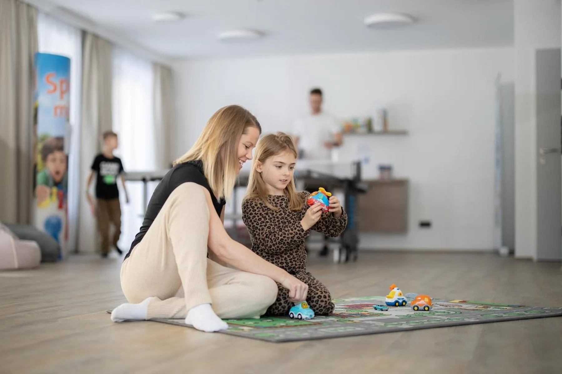 Family in ALPRIMA Aparthotel Hinterstoder