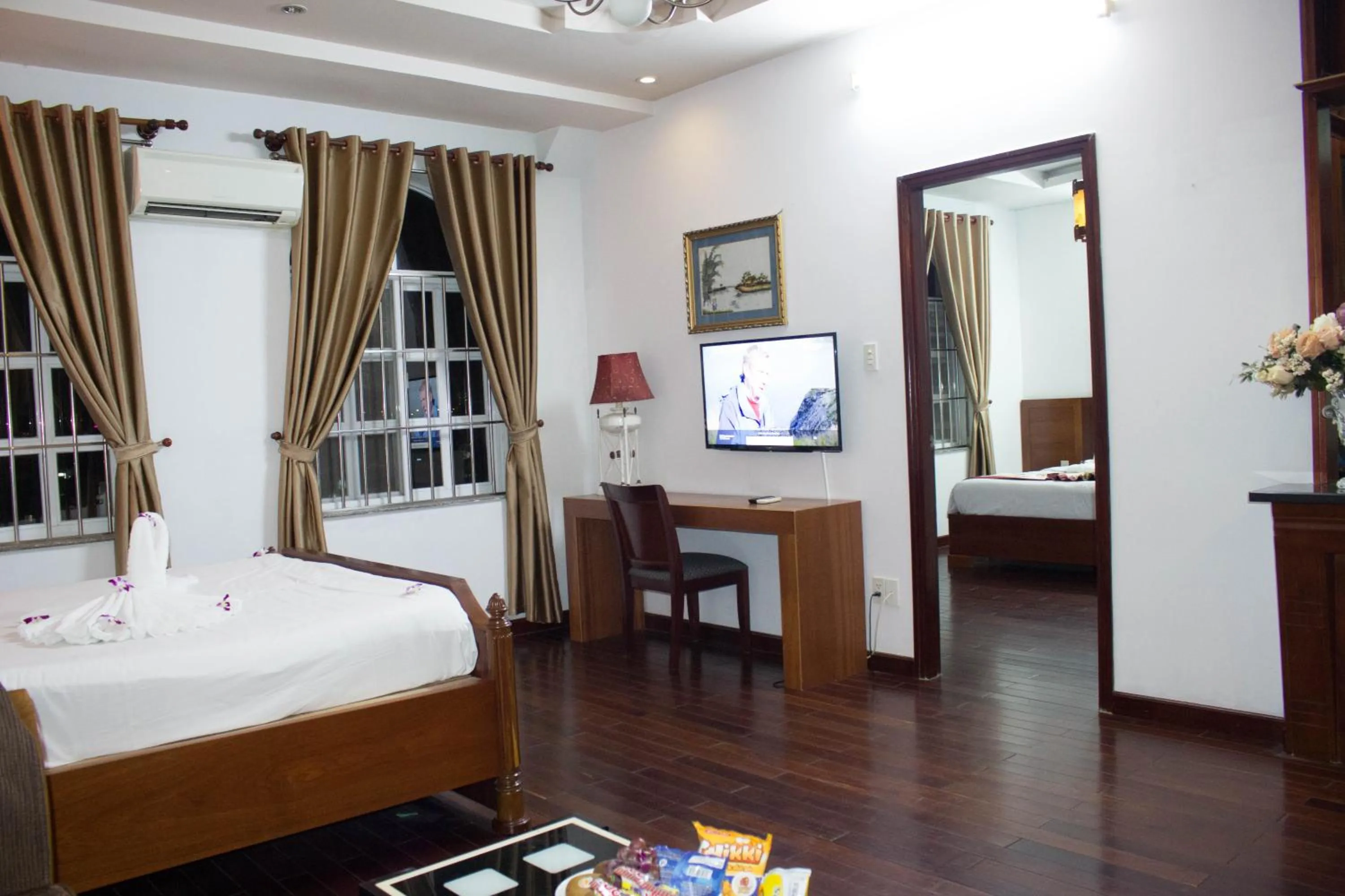 Communal lounge/ TV room, Bed in Hoa Phat Hotel & Apartment