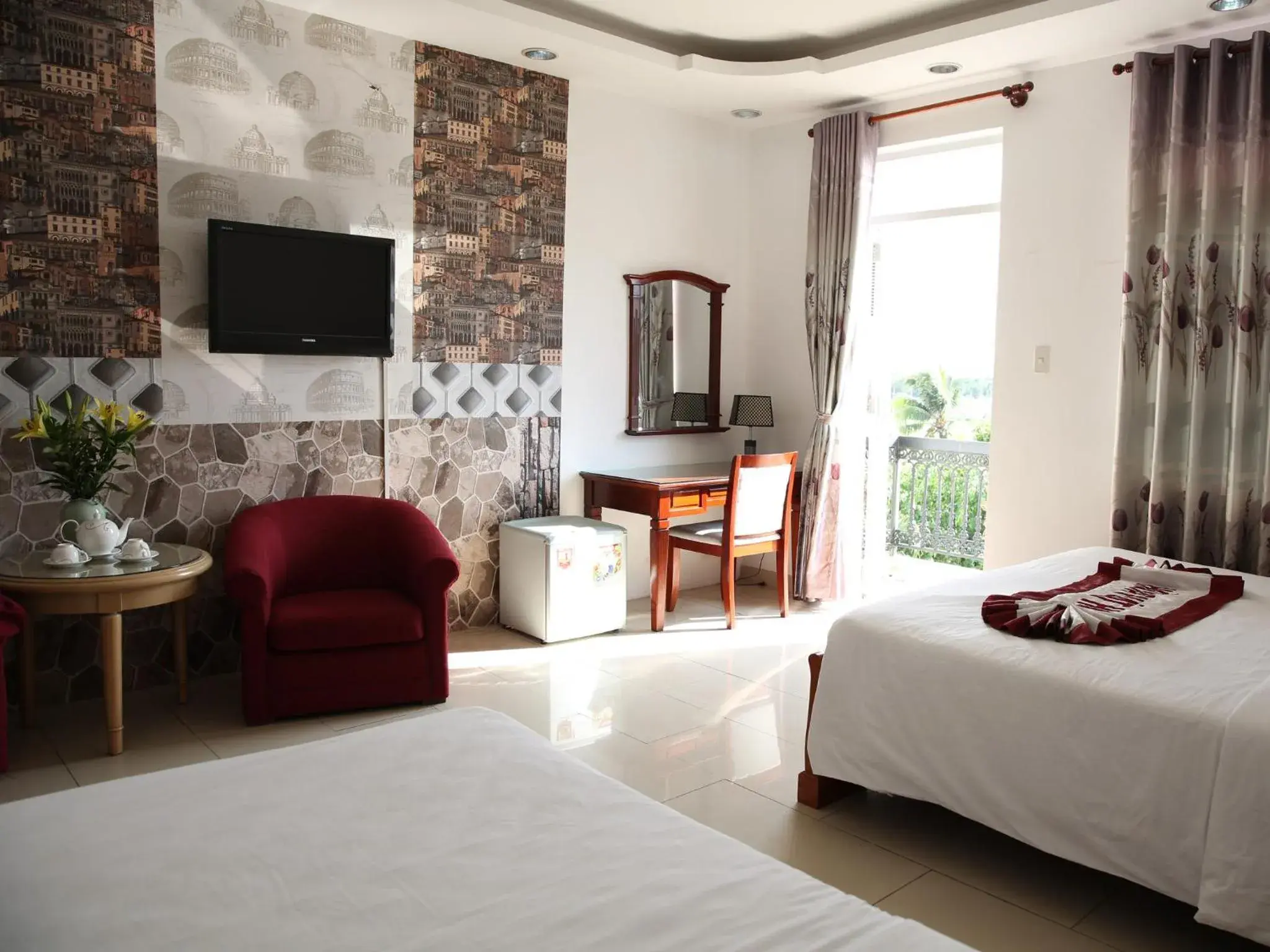 Family Room with Balcony in Hoa Phat Hotel & Apartment Family Room with Balcony in Hoa Phat Hotel & Apartment