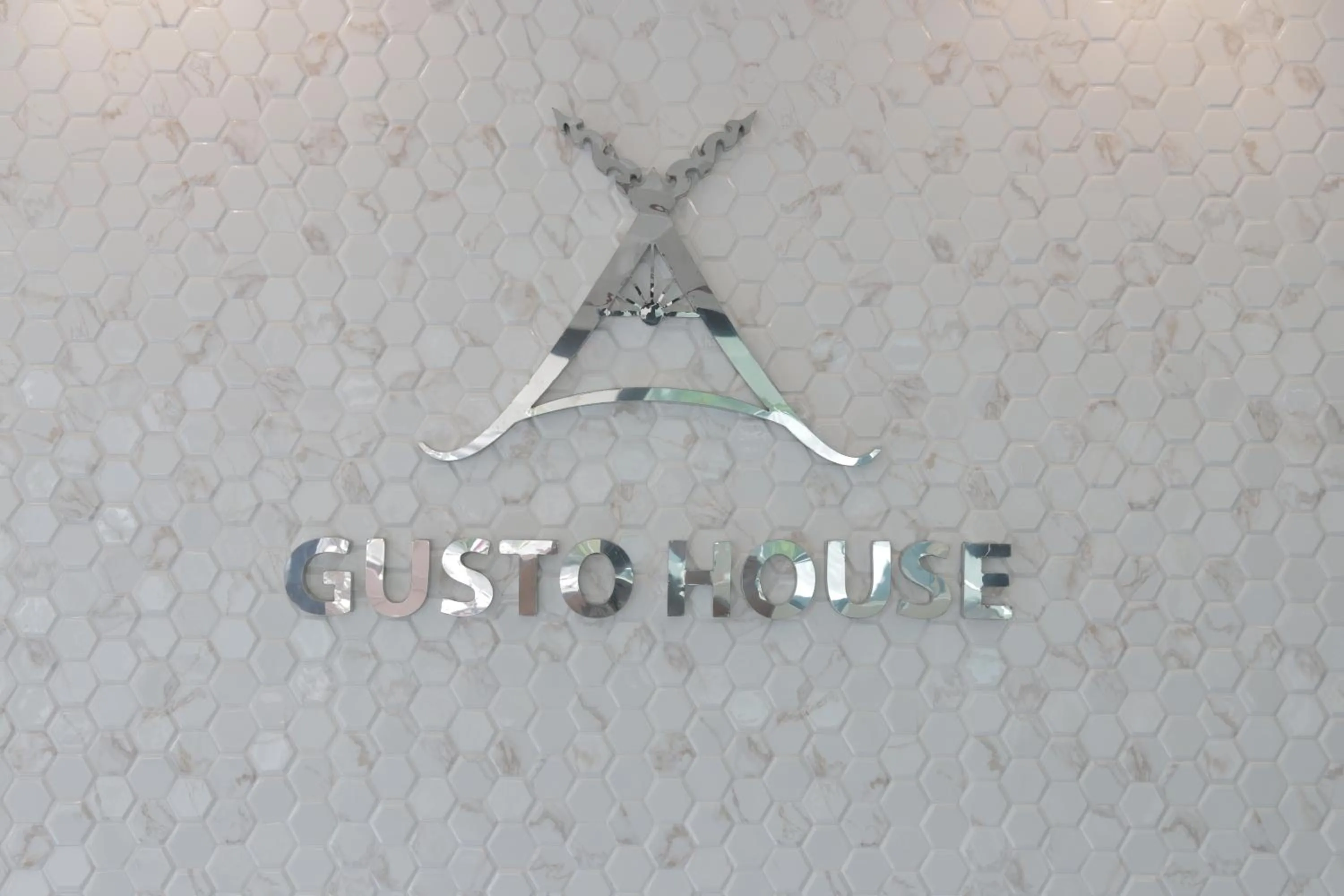 Property logo or sign in Gusto House