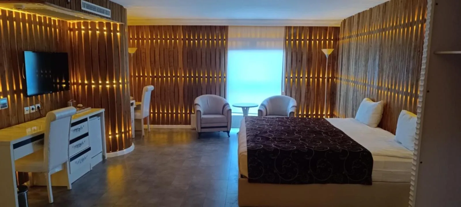 Bed in Demosan Hotel