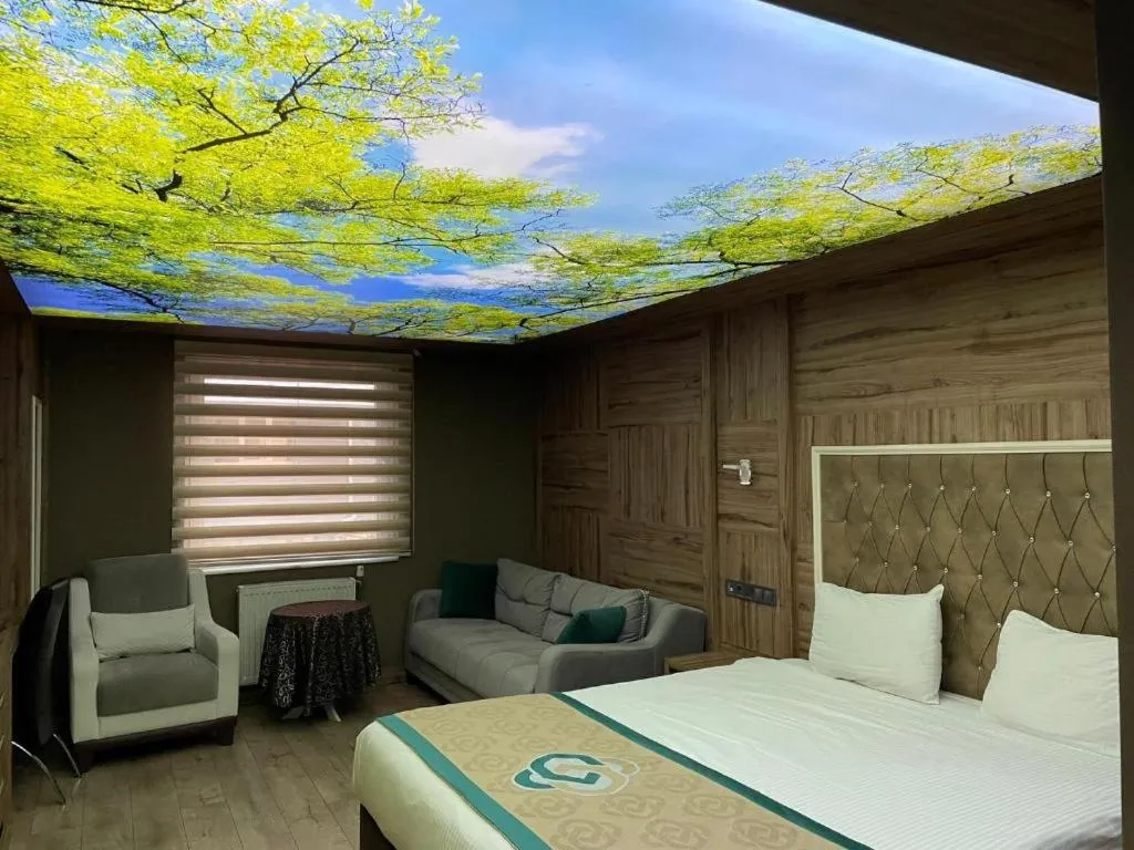 Bed in Demosan Hotel