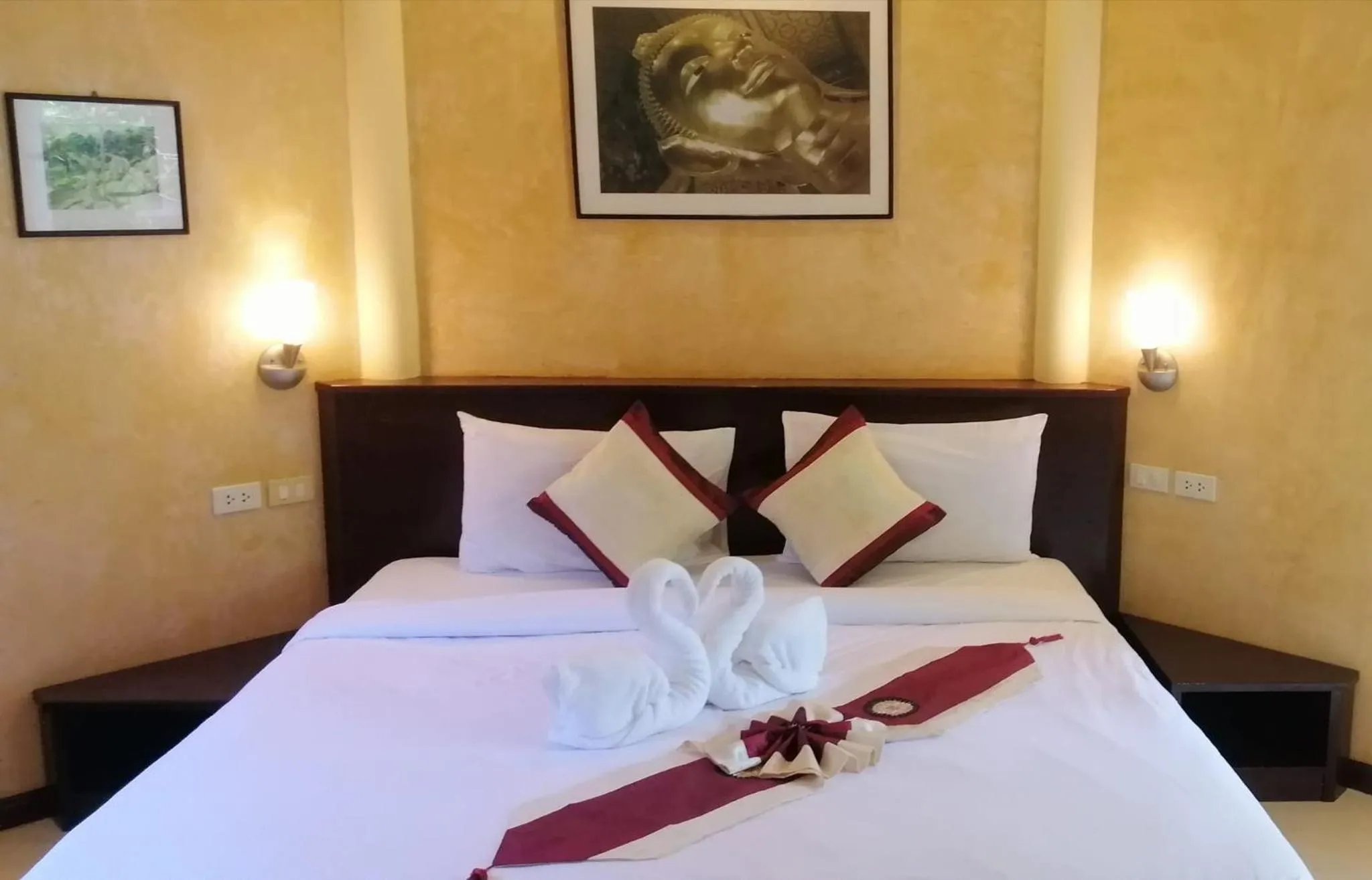 Bed in Palm Garden Resort