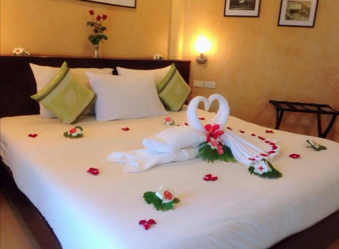 Bed in Palm Garden Resort