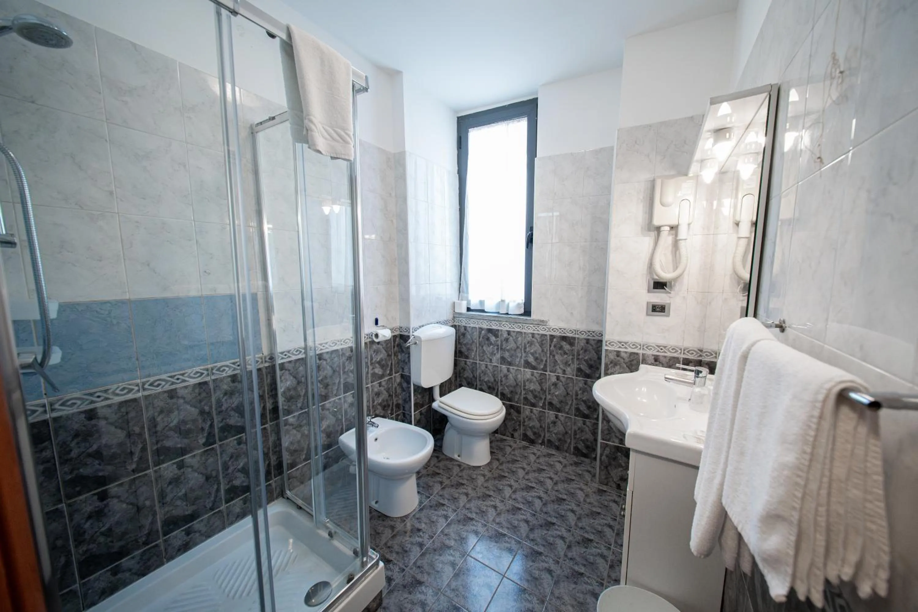 Bathroom in Hotel Cavour Resort