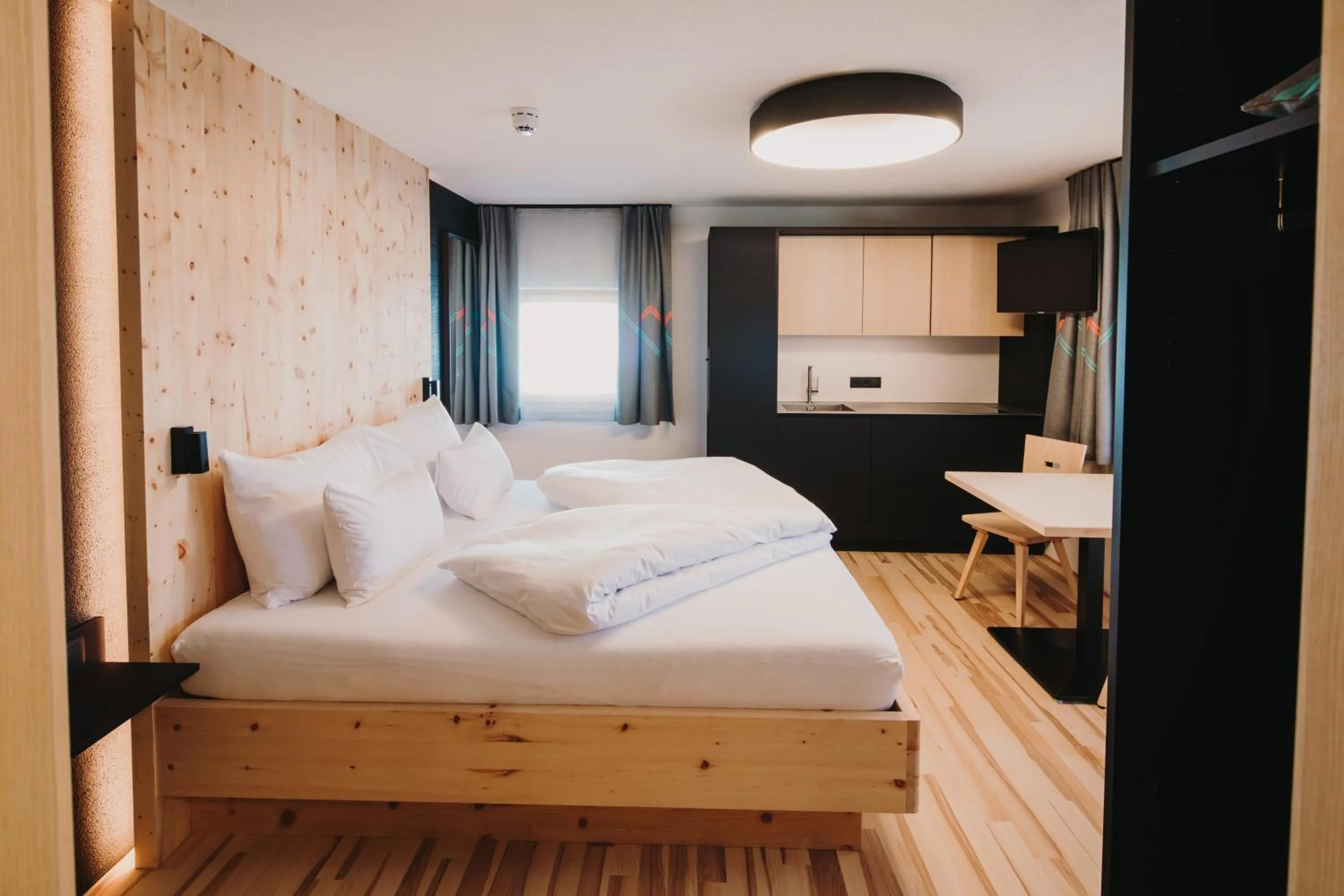 Photo of the whole room, Bed in Alpin - Studios & Suites