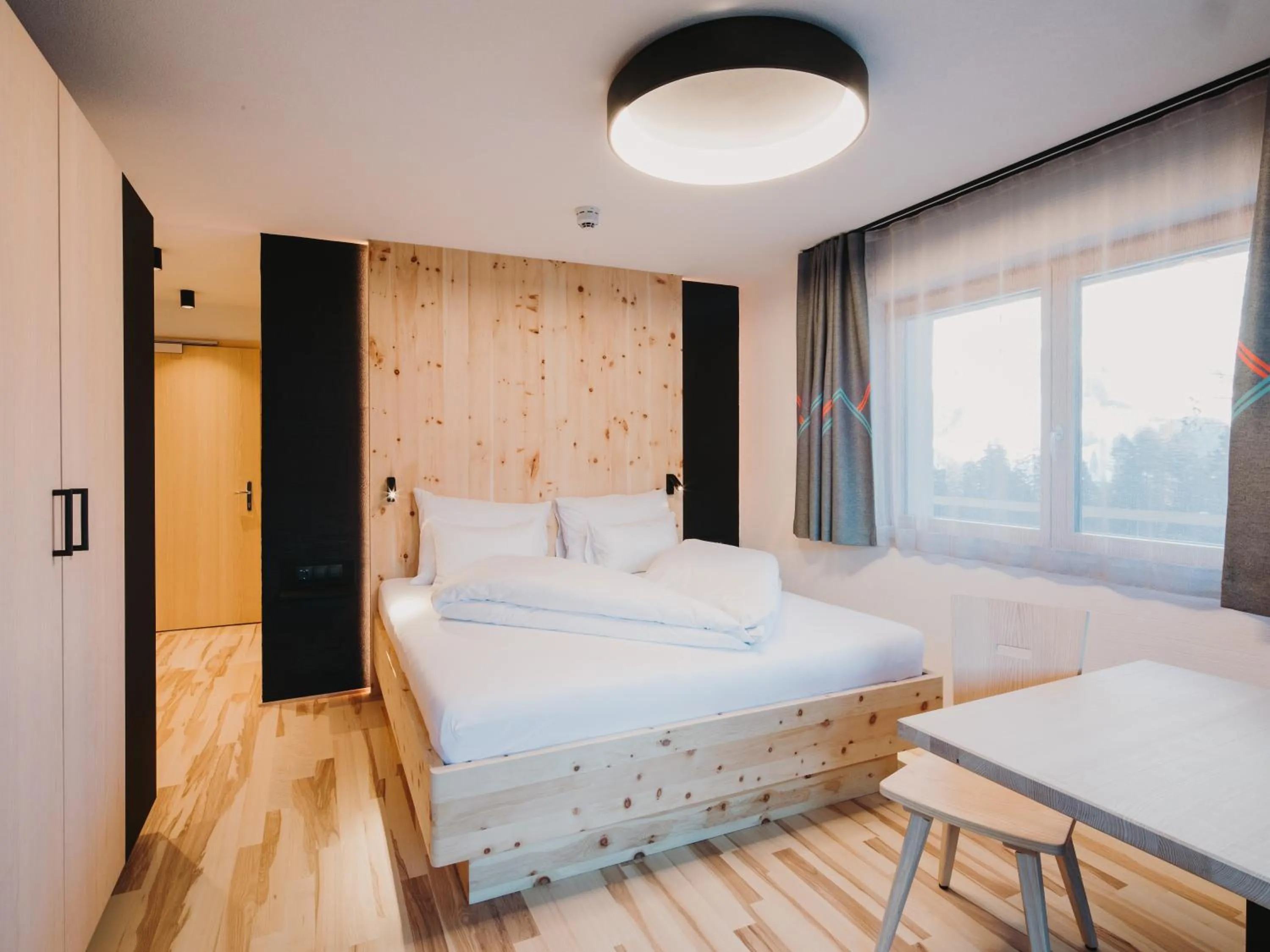 Photo of the whole room, Bed in Alpin - Studios & Suites