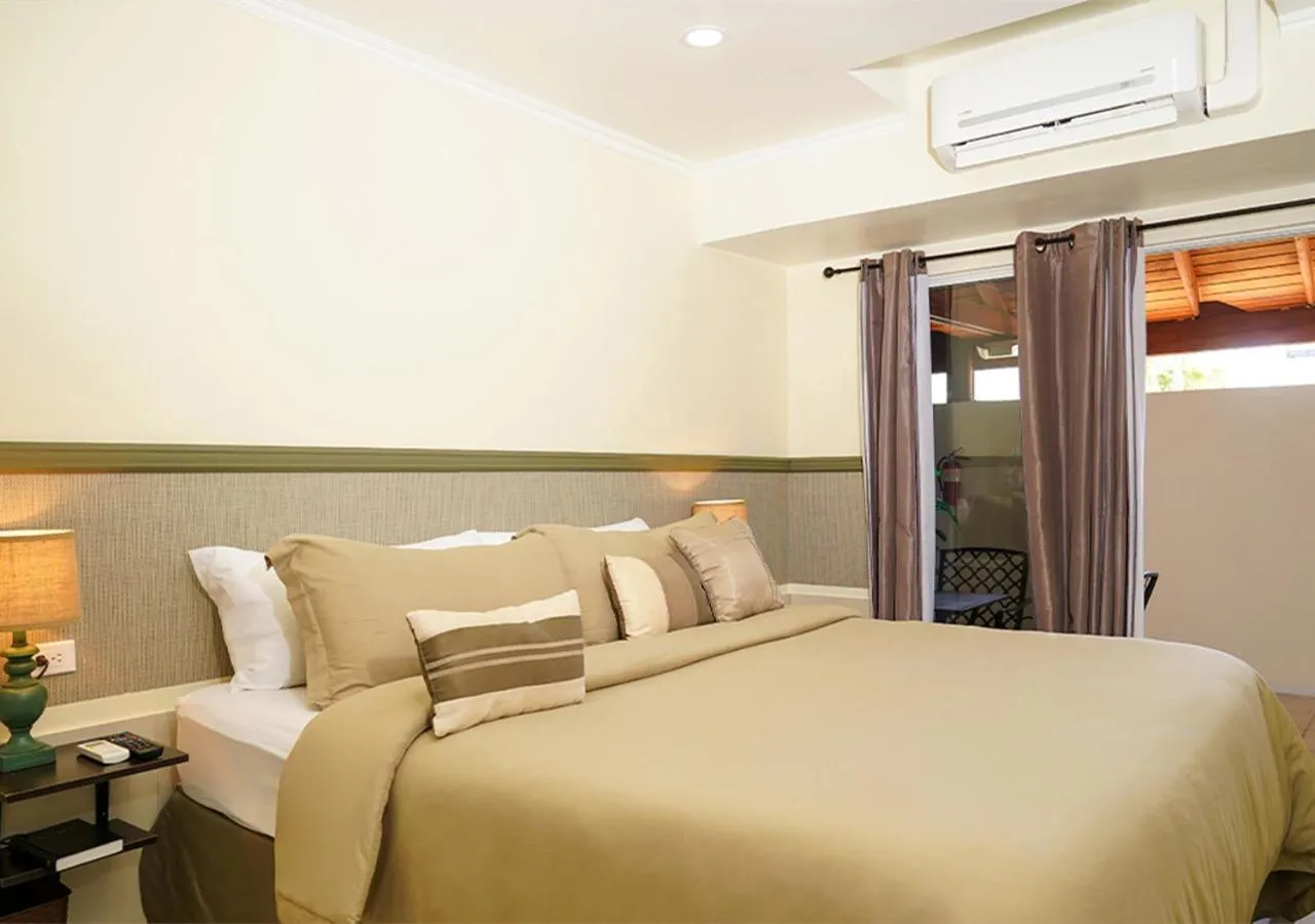 Bed in Yoyita Suites Aruba