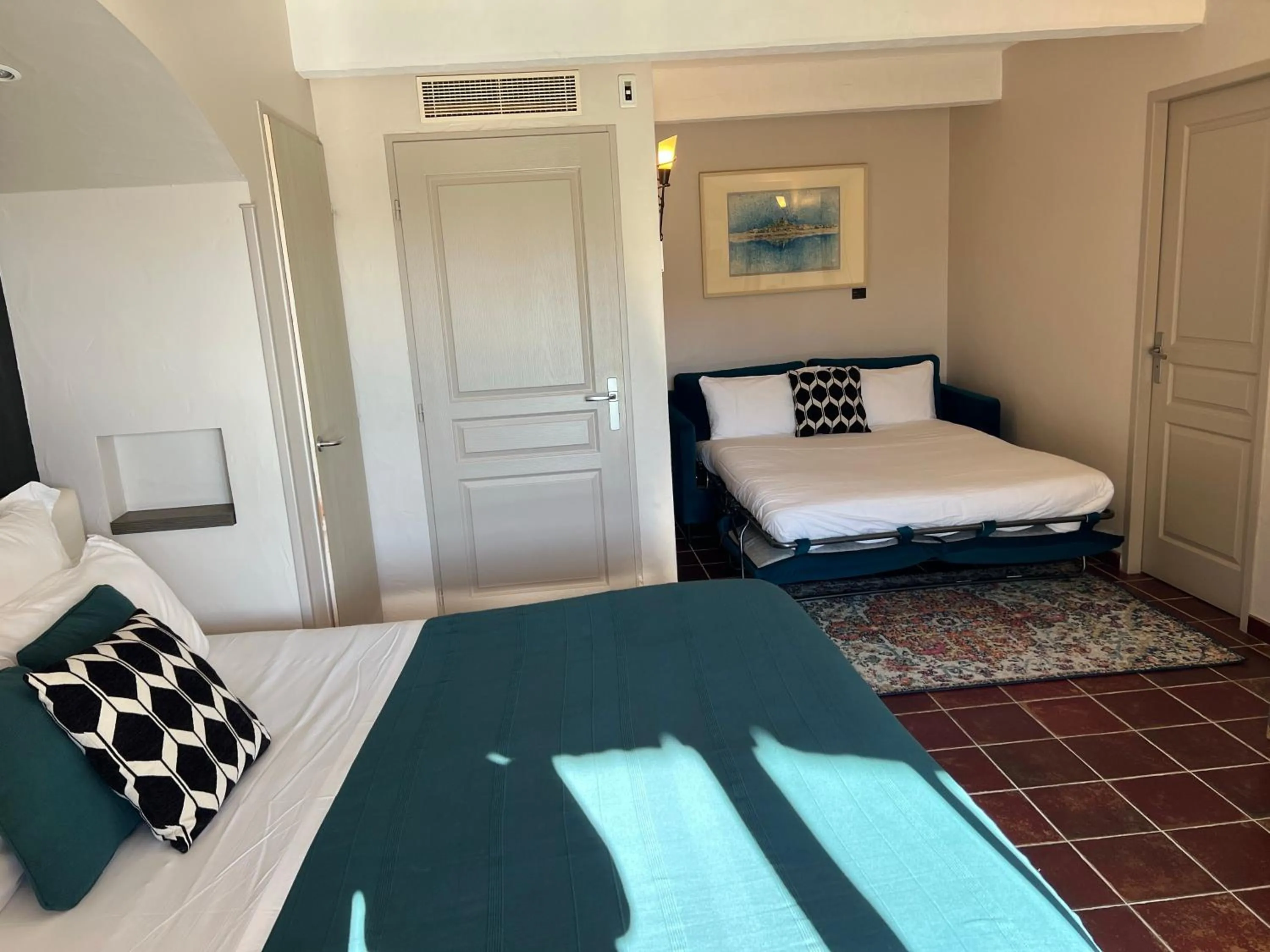 Bed in Logis Hôtel Restaurant La Bergerie