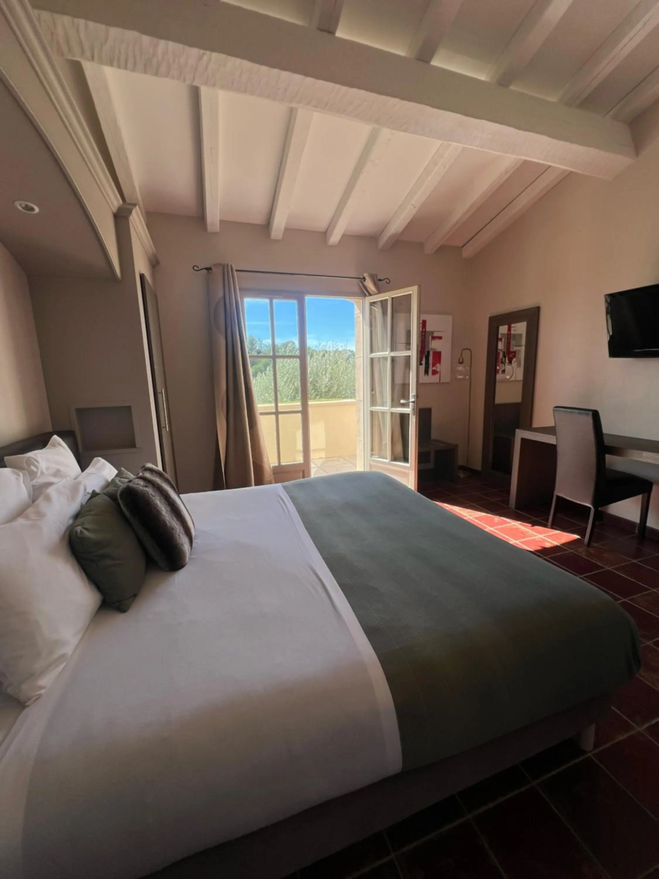 Photo of the whole room, Bed in Logis Hôtel Restaurant La Bergerie