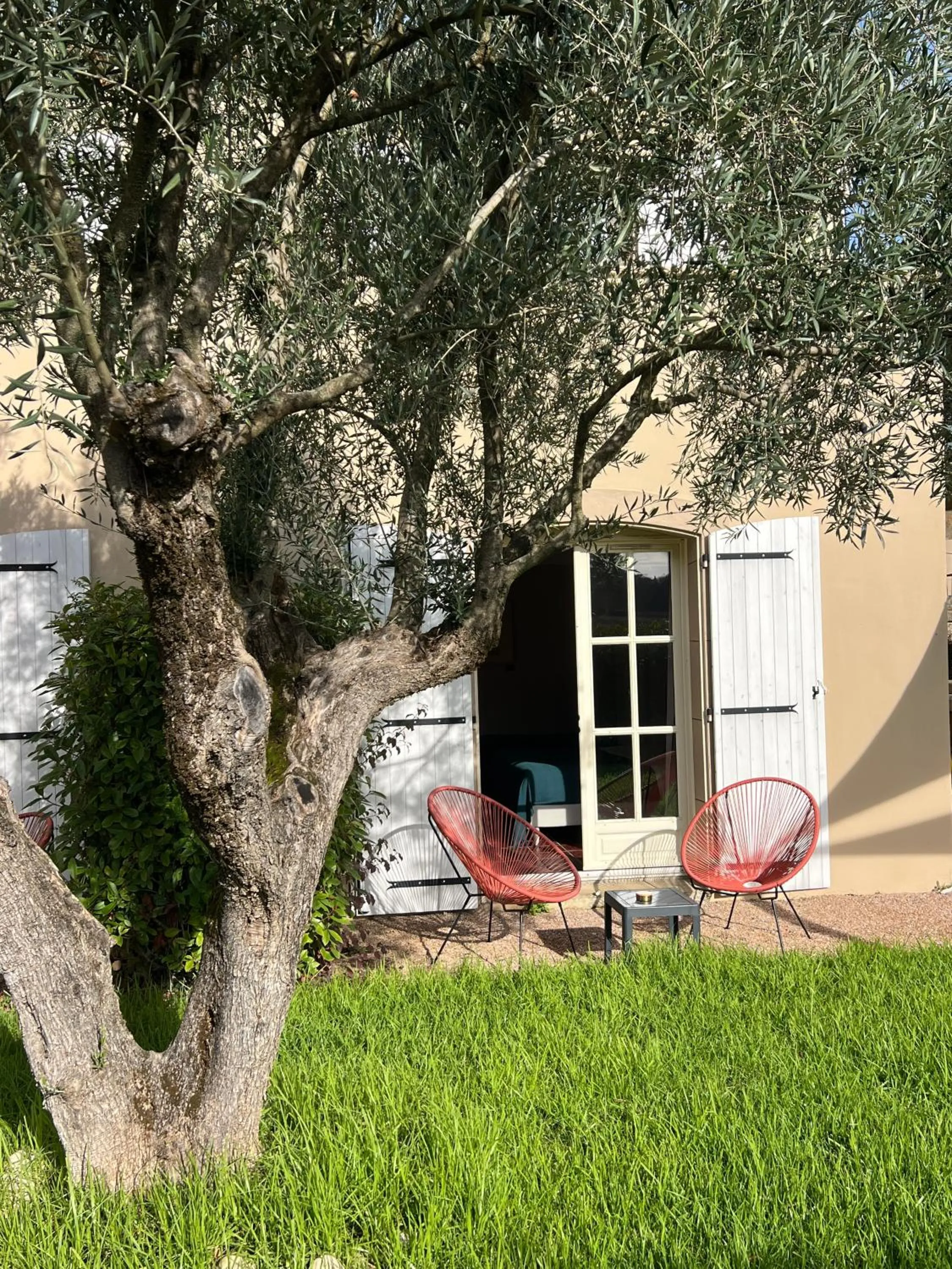 Garden in Logis Hôtel Restaurant La Bergerie