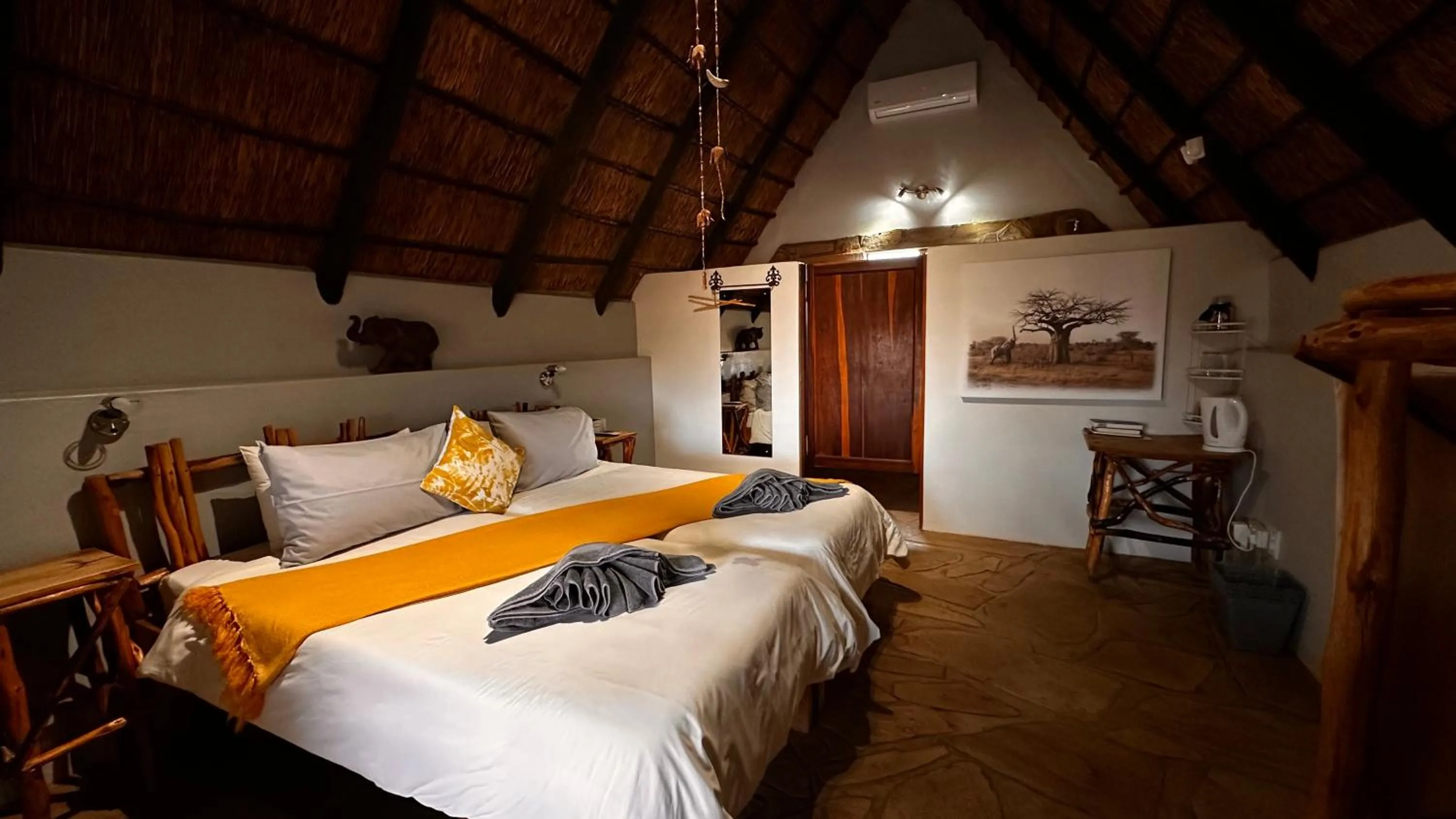 Bed in Ohange Namibia Lodge