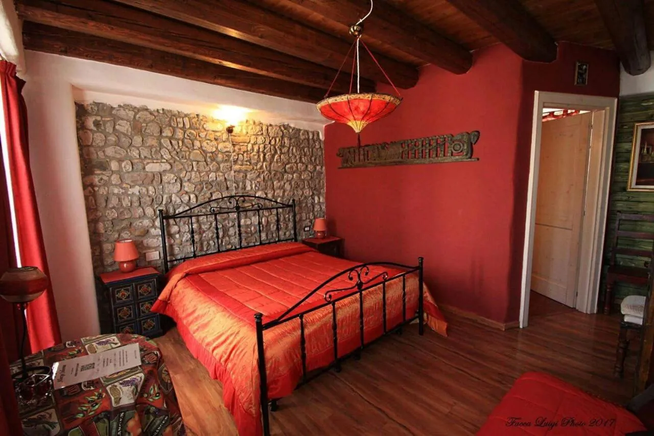 Photo of the whole room, Bed in Albergo Julienne