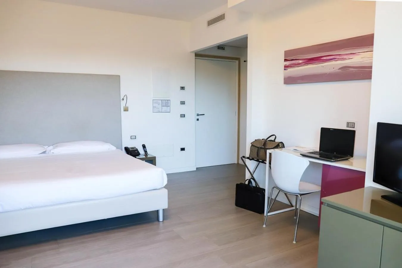 Bed in Smeraldo Suites & Spa