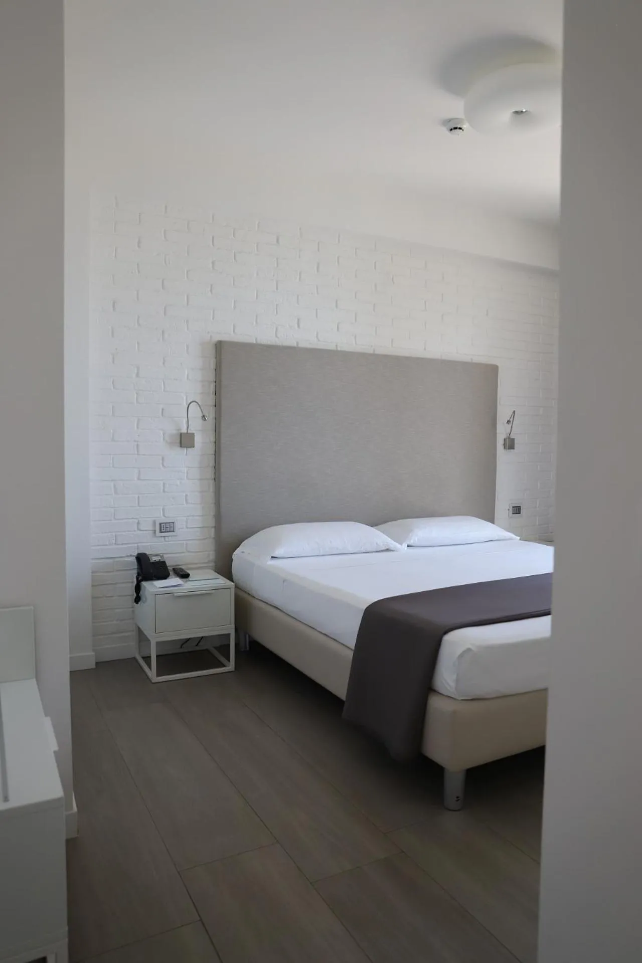 Bed in Smeraldo Suites & Spa