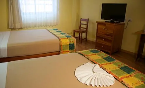 Property building, Bed in Hotel Madan Cárdenas