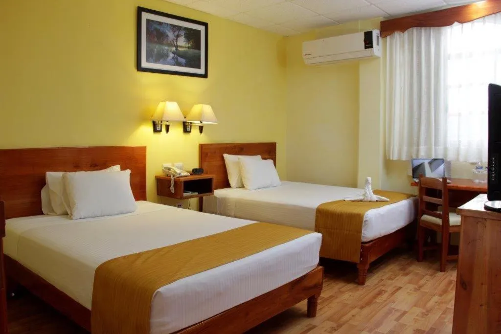 Bed in Hotel Madan Cárdenas