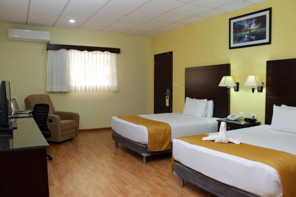 Bed in Hotel Madan Cárdenas