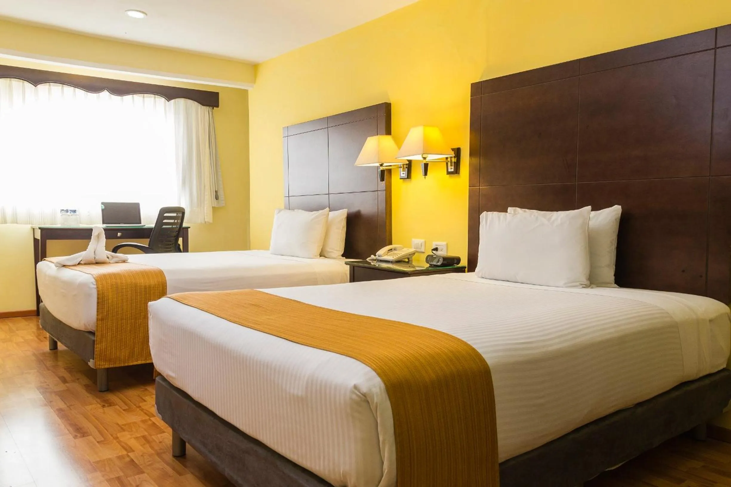 Bed in Hotel Madan Cárdenas