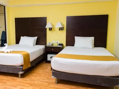 Bed in Hotel Madan Cárdenas