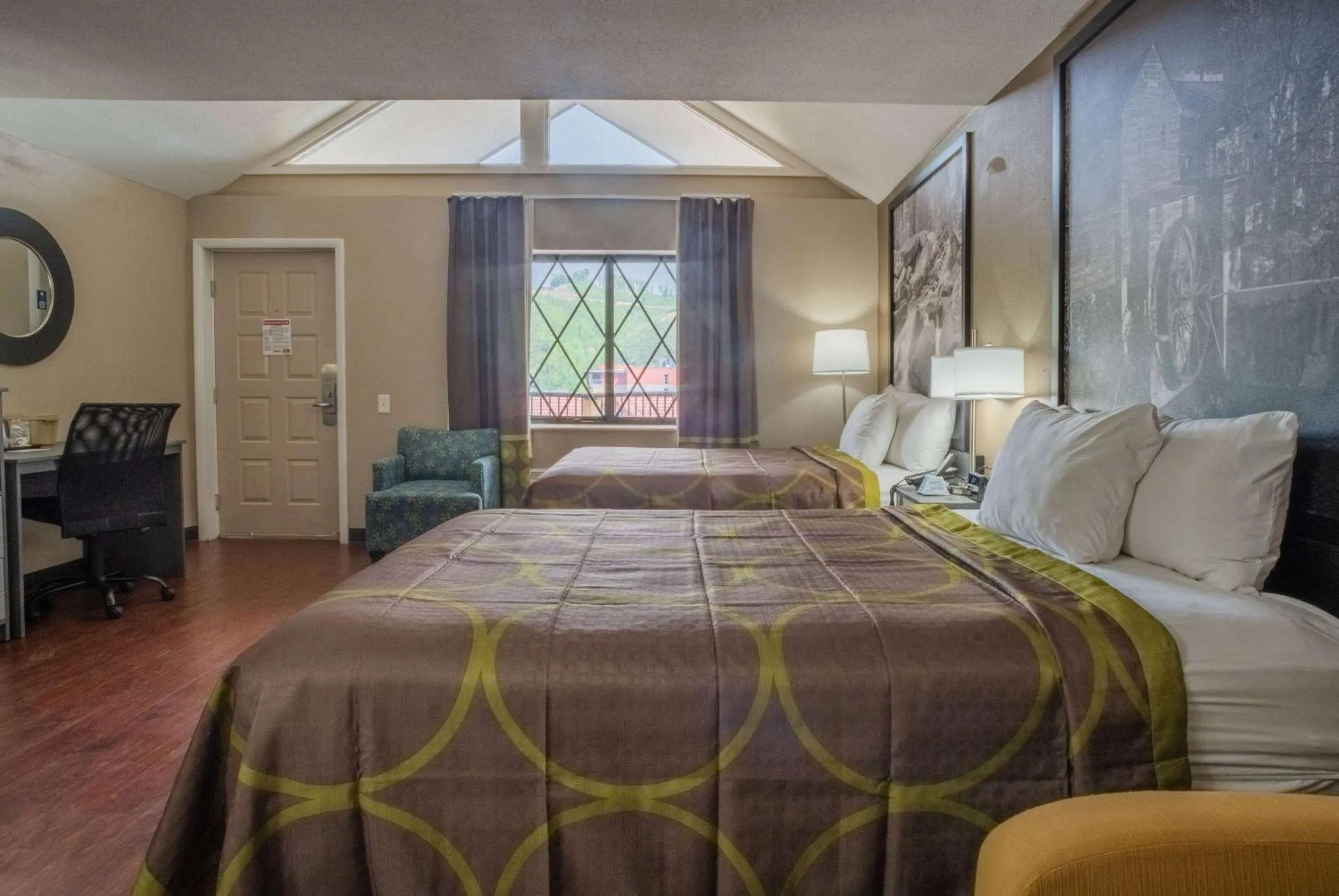 Photo of the whole room, Bed in Super 8 by Wyndham Downtown Gatlinburg at Convention Center