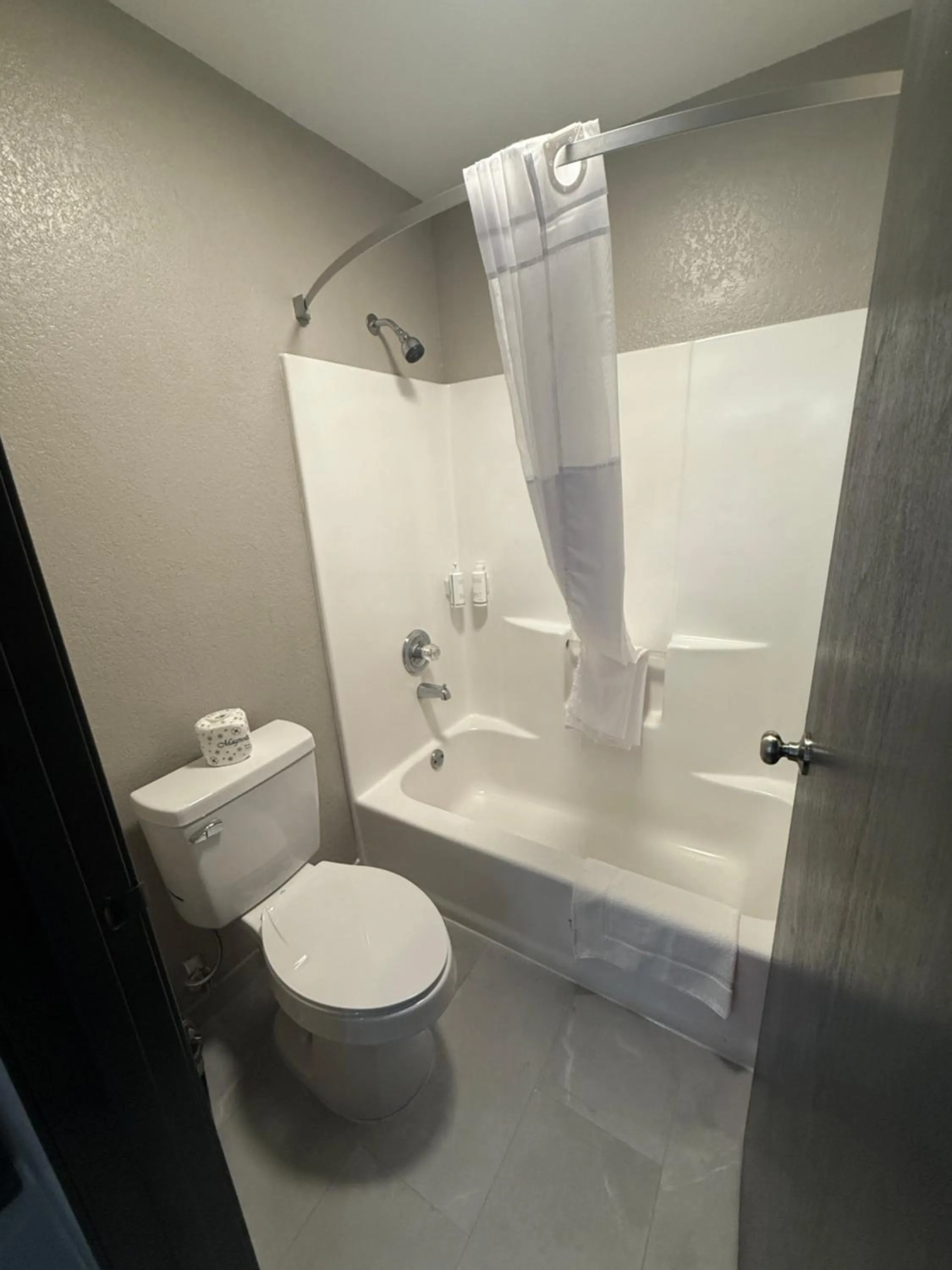 Toilet in Super 8 by Wyndham Richfield Cleveland